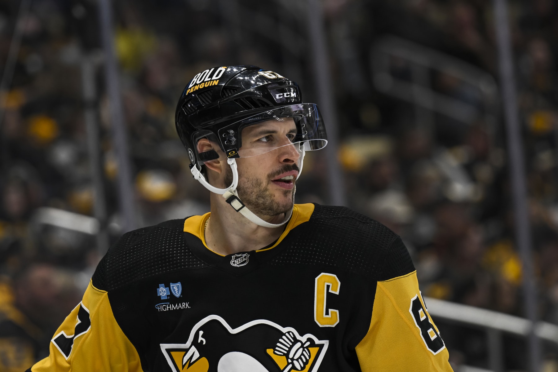 PITTSBURGH, PA - APRIL 13: Pittsburgh Penguins center Sidney Crosby (87) looks on during the third period in the NHL game between the Pittsburgh Penguins and the Boston Bruins on April 13, 2024, at PPG Paints Arena in Pittsburgh, PA. (Photo by Jeanine Leech/Icon Sportswire via Getty Images)