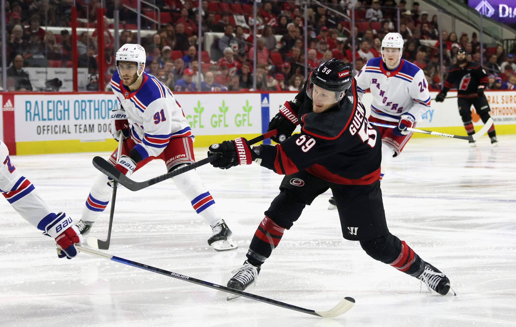 RALEIGH, NORTH CAROLINA - MAY 11: Jake Guentzel #59 of the Carolina Hurricanes takes the shot against the New York Rangers in Game Four of Round Two of the 2024 Stanley Cup Playoffs at PNC Arena on May 11, 2024 in Raleigh, North Carolina. (Photo by Bruce Bennett/Getty Images)
