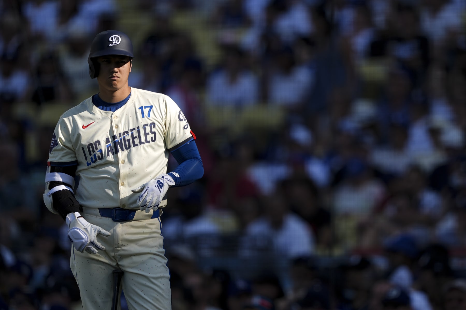 LOS ANGELES, CALIFORNIA - JULY 06: Shohei Ohtani #17 of the Los Angeles Dodgers looks on while on deck against the Milwaukee Brewers during the fourth inning at Dodger Stadium on July 06, 2024 in Los Angeles, California. (Photo by Michael Owens/Getty Images)