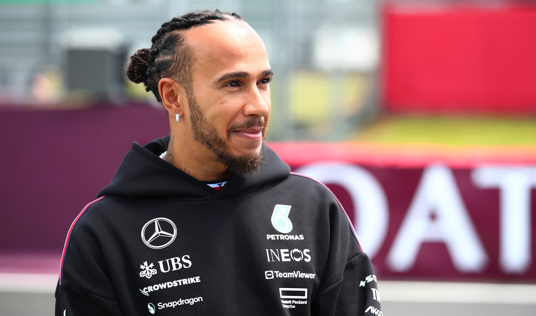NORTHAMPTON, ENGLAND - JULY 07: Lewis Hamilton of Great Britain and Mercedes looks on from the drivers parade prior to the F1 Grand Prix of Great Britain at Silverstone Circuit on July 07, 2024 in Northampton, England. (Photo by Joe Portlock - Formula 1/Formula 1 via Getty Images)