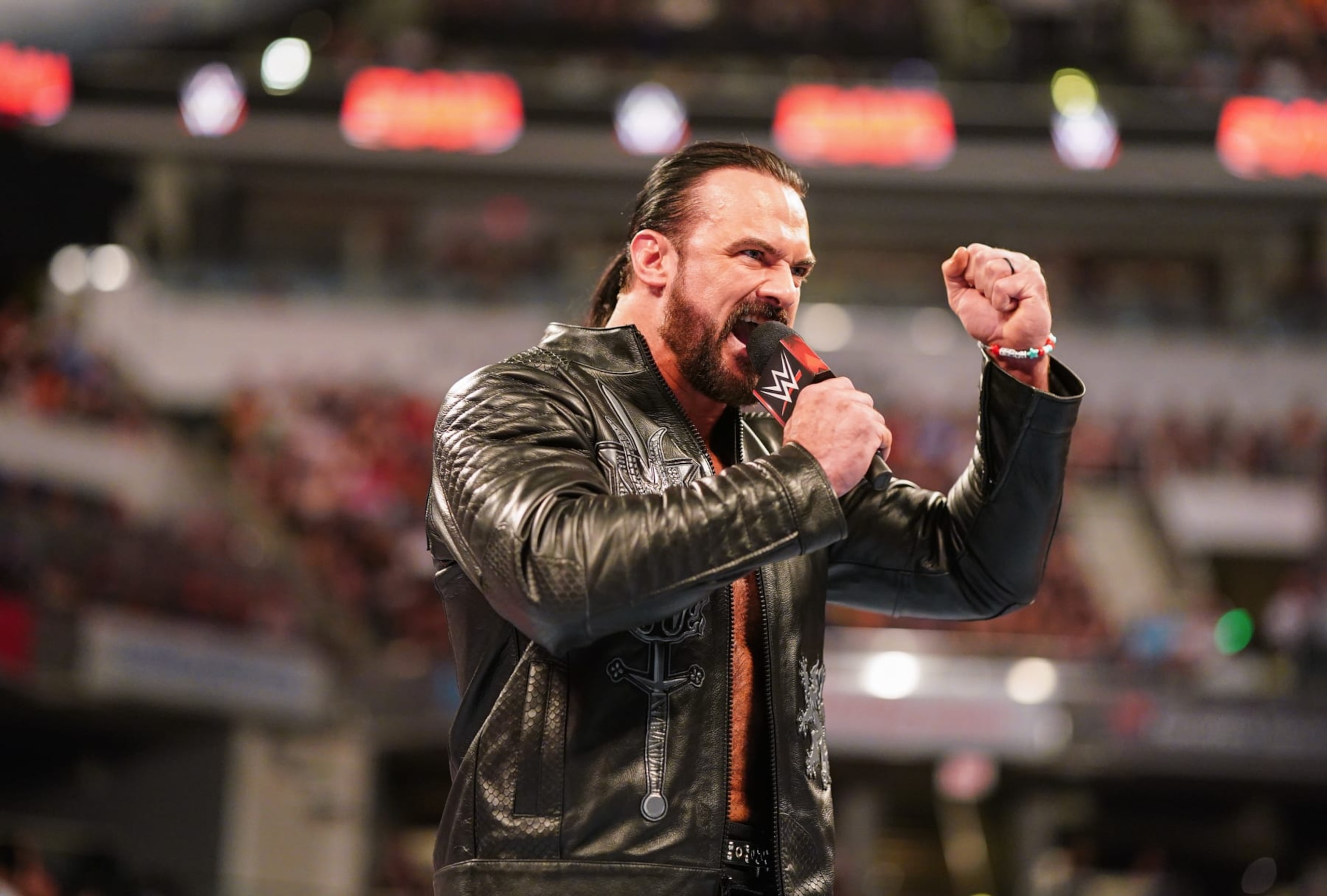 INDIANAPOLIS, INDIANA - JUNE 24: Drew McIntyre speaks while wearing CM Punk's bracelet during Monday Night RAW at Gainbridge Fieldhouse on June 24, 2024 in Indianapolis, Indiana. (Photo by WWE/Getty Images) INDIANAPOLIS, INDIANA - JUNE 24: Drew McIntyre speaks while wearing CM Punk's bracelet during Monday Night RAW at Gainbridge Fieldhouse on June 24, 2024 in Indianapolis, Indiana. (Photo by WWE/Getty Images)