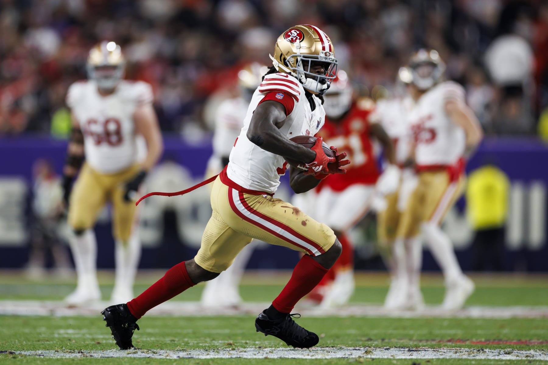 LAS VEGAS, NEVADA - FEBRUARY 11: Brandon Aiyuk #11 of the San Francisco 49ers runs the ball after a catch during Super Bowl LVIII against the Kansas City Chiefs at Allegiant Stadium on February 11, 2024 in Las Vegas, Nevada. (Photo by Ryan Kang/Getty Images)