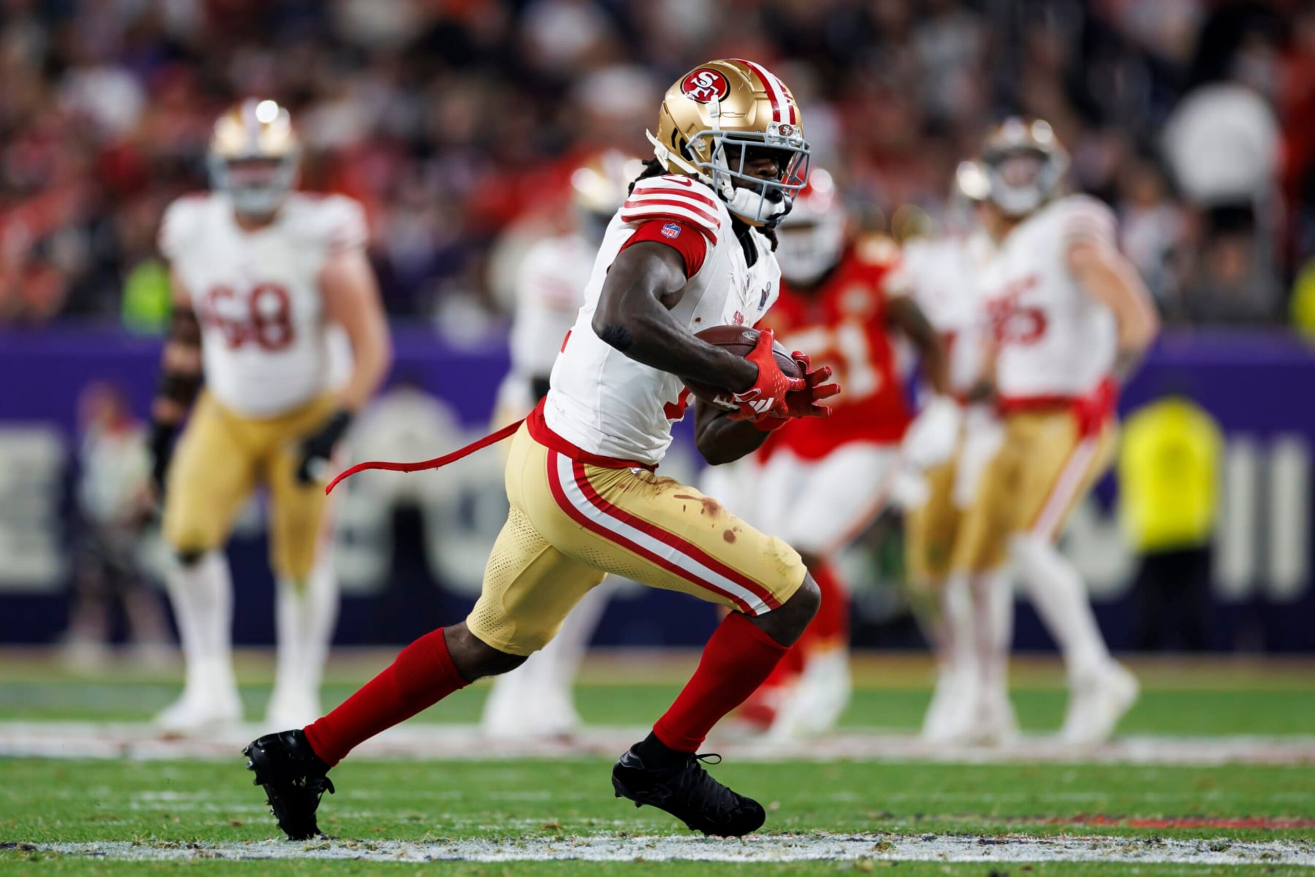 LAS VEGAS, NEVADA - FEBRUARY 11: Brandon Aiyuk #11 of the San Francisco 49ers runs the ball after a catch during Super Bowl LVIII against the Kansas City Chiefs at Allegiant Stadium on February 11, 2024 in Las Vegas, Nevada. (Photo by Ryan Kang/Getty Images)