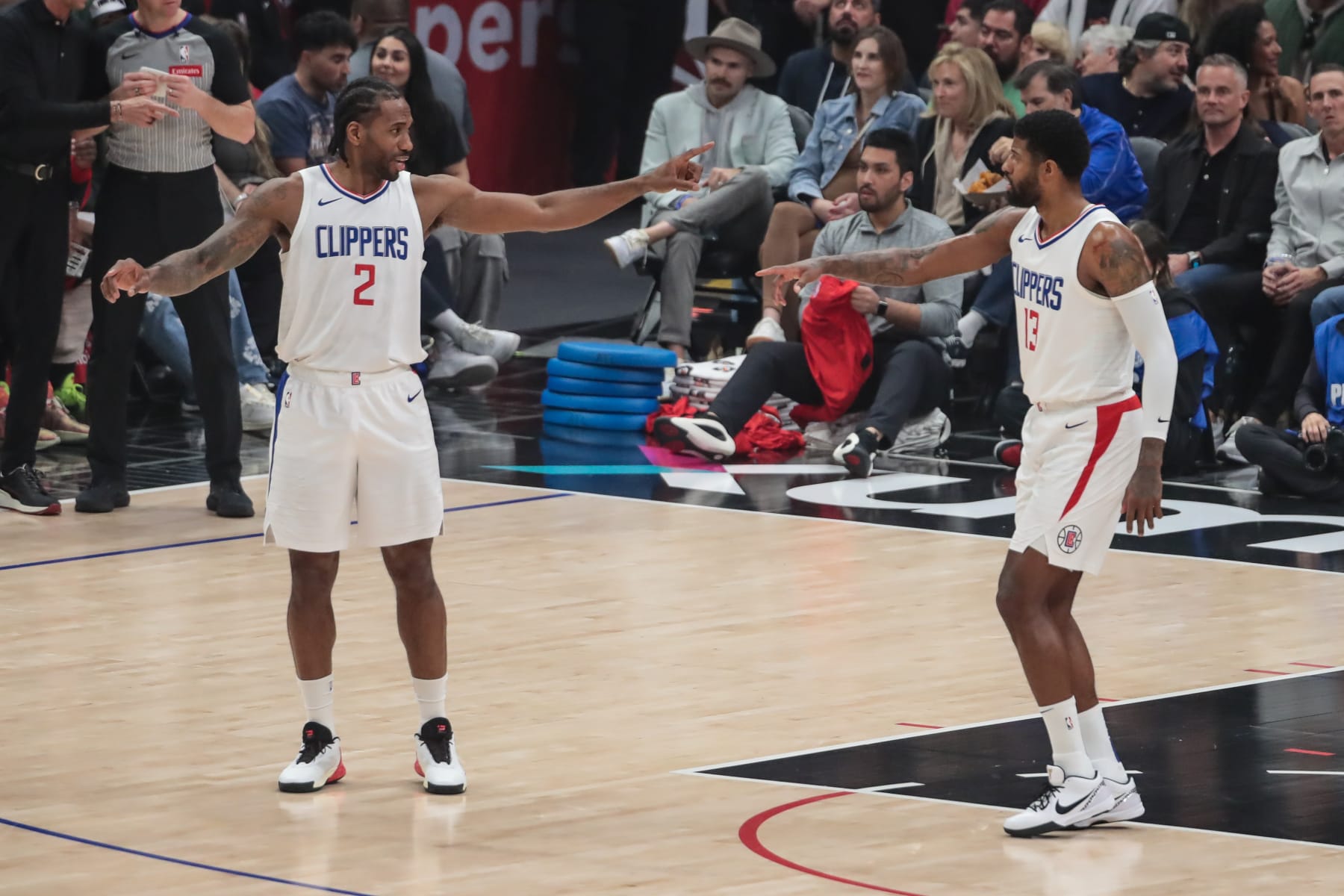 LOS ANGELES, CA - MARCH 17: LA Clippers forward Kawhi Leonard (2) points at LA Clippers forward Paul George (13) during the NBA game between the Atlanta Hawks and the  LA Clippers on March 17, 2024, at Crypto.com Arena in Los Angeles, CA. (Photo by Jevone Moore/Icon Sportswire via Getty Images)