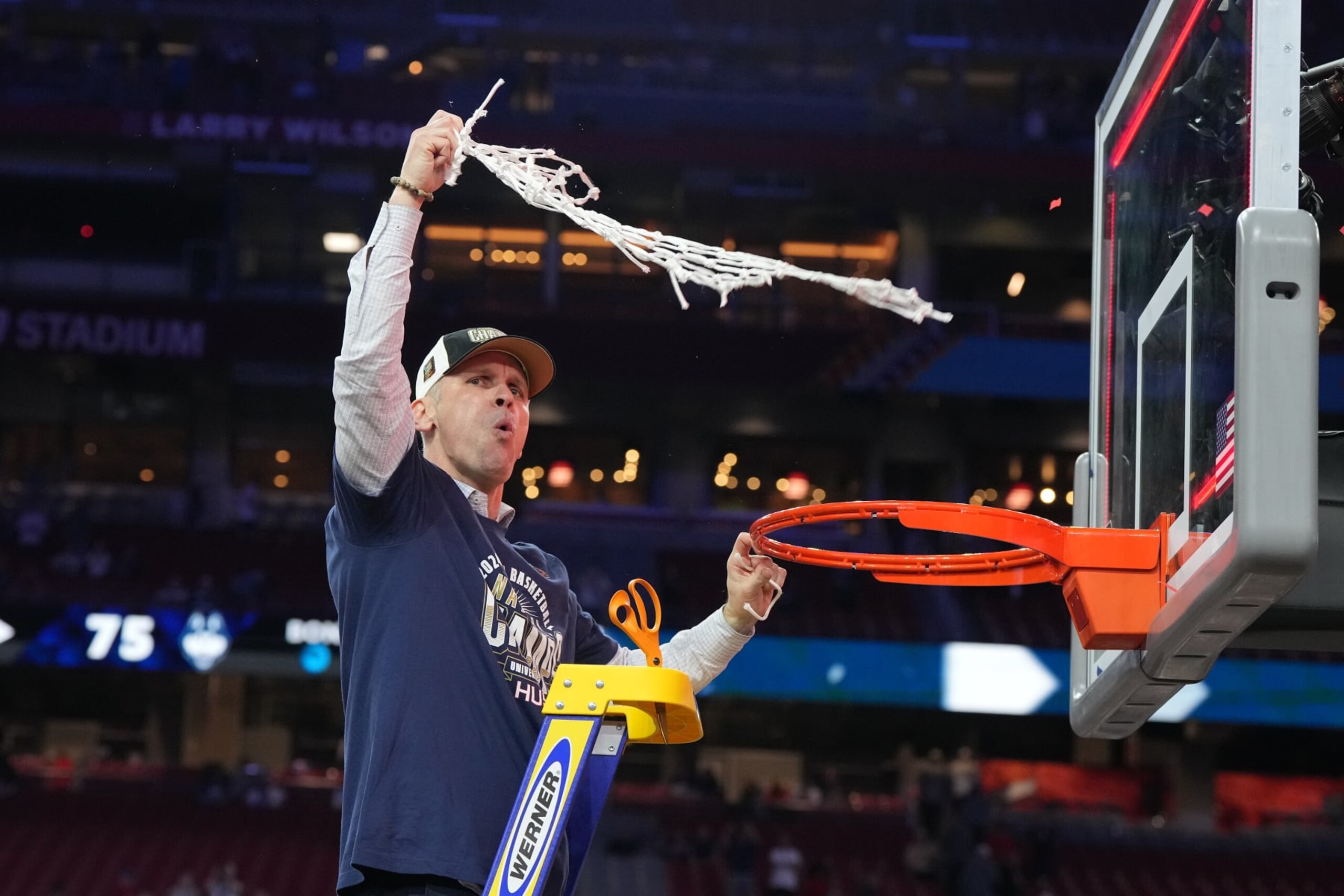GLENDALE, ARIZONA - APRIL 08:  Head coach Dan Hurley of the Connecticut Huskies celebrates after cutting the net after the National College Basketball Championship game against the Purdue Boilermakers at State Farm Stadium on April 08, 2024 in Glendale, Arizona.  (Photo by Mitchell Layton/Getty Images)