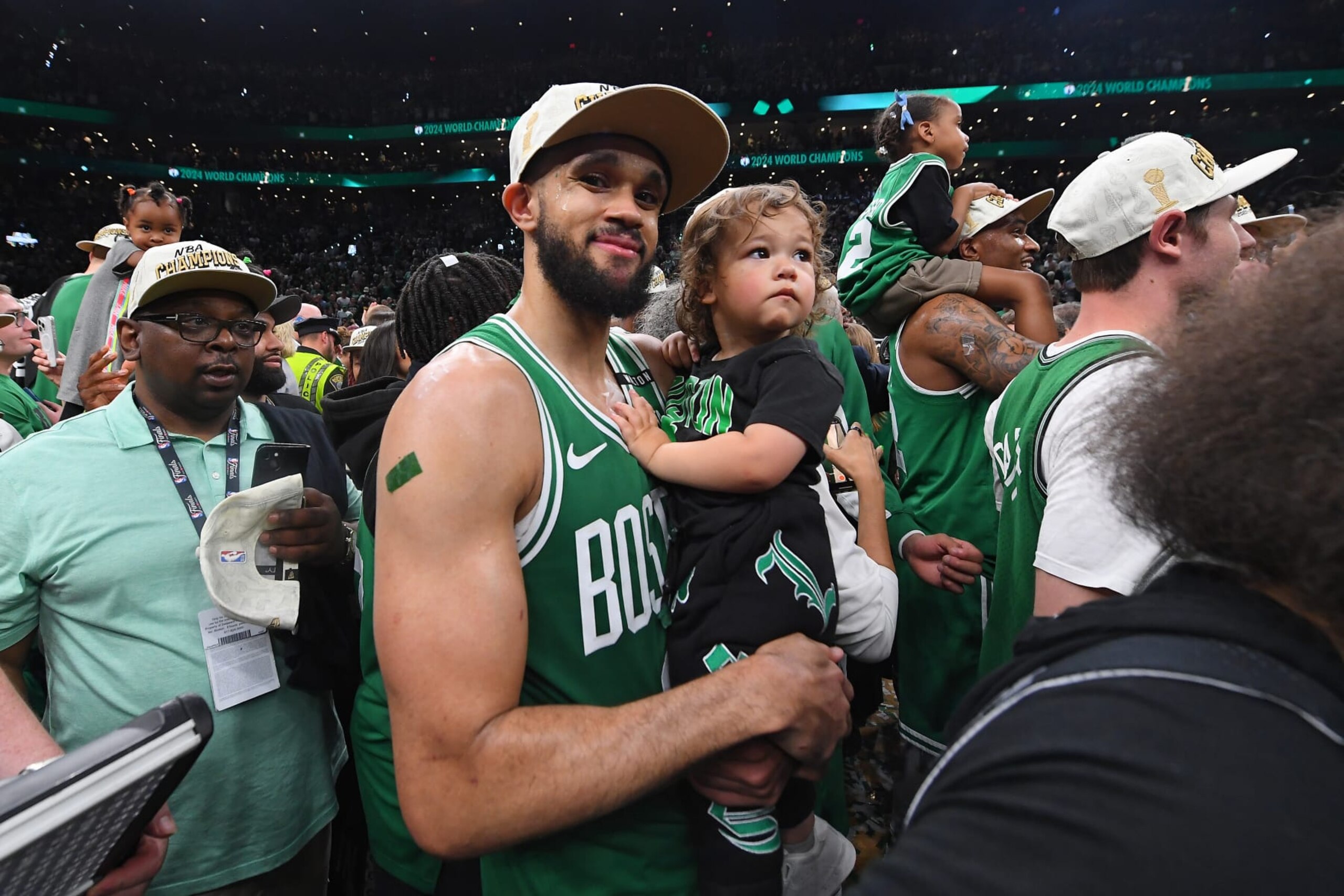 BOSTON, MA - JUNE 17: Derrick White #9 of the Boston Celtics smiles after winning the 2024 NBA Championship against the Dallas Mavericks during Game 5 of the 2024 NBA Finals on June 17, 2024 at the TD Garden in Boston, Massachusetts. NOTE TO USER: User expressly acknowledges and agrees that, by downloading and or using this photograph, User is consenting to the terms and conditions of the Getty Images License Agreement. Mandatory Copyright Notice: Copyright 2024 NBAE  (Photo by Brian Babineau/NBAE via Getty Images)