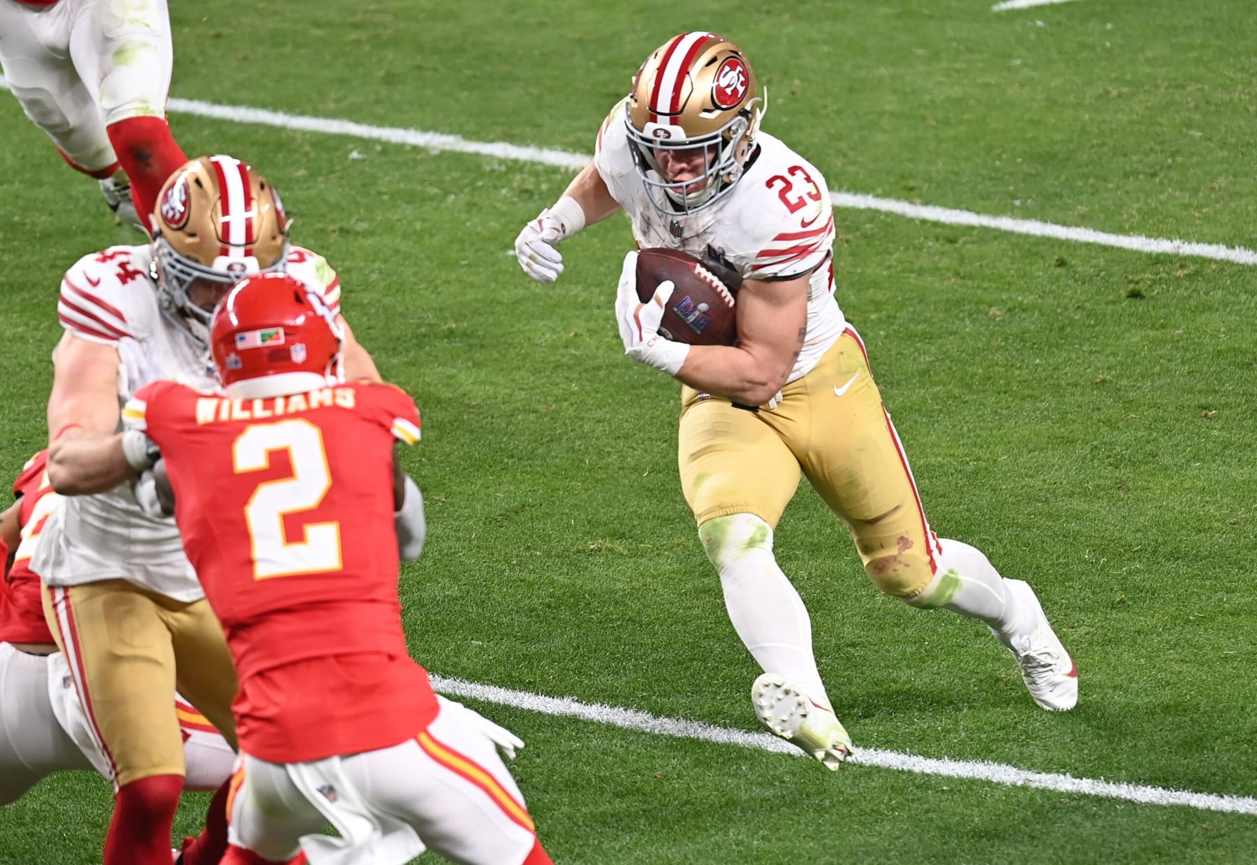 LAS VEGAS, NEVADA - FEBRUARY 11: Christian McCaffrey #23 of the San Francisco 49ers carries the ball against the Kansas City Chiefs in the second half during Super Bowl LVIII at Allegiant Stadium on February 11, 2024 in Las Vegas, Nevada. (Photo by Focus on Sport/Getty Images)