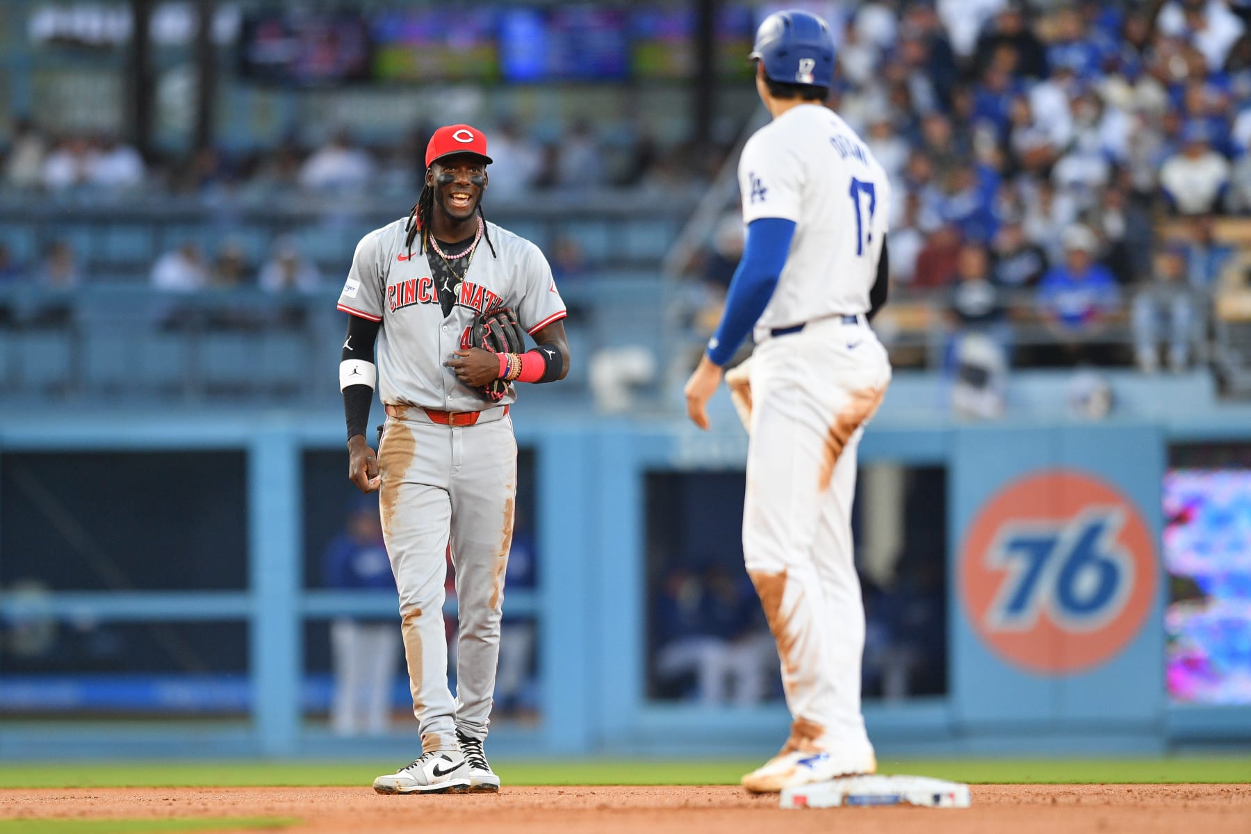 LOS ANGELES, CA - MAY 16: Cincinnati Reds shortstop Elly De La Cruz (44) jokes with Los Angeles Dodgers designated hitter Shohei Ohtani (17) during the MLB game between the Cincinnati Reds and the Los Angeles Dodgers on May 16, 2024 at Dodger Stadium in Los Angeles, CA. (Photo by Brian Rothmuller/Icon Sportswire via Getty Images)