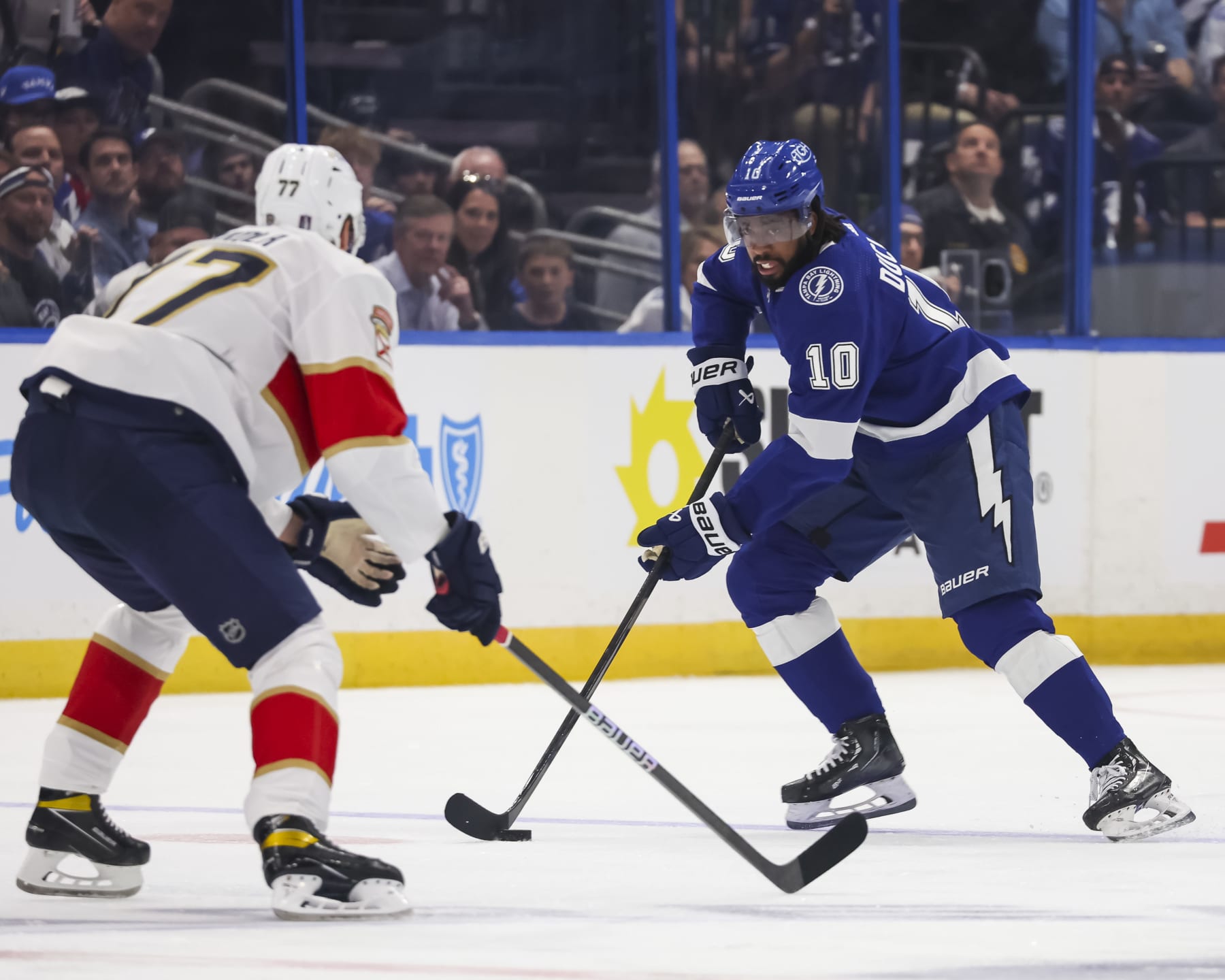 TAMPA, FL - APRIL 25: Anthony Duclair #10 of the Tampa Bay Lightning skates against Niko Mikkola #77 of the Florida Panthers in Game Three of the First Round of the 2024 Stanley Cup Playoffs at Amalie Arena on April 25, 2024 in Tampa, Florida. (Photo by Mark LoMoglio/NHLI via Getty Images)