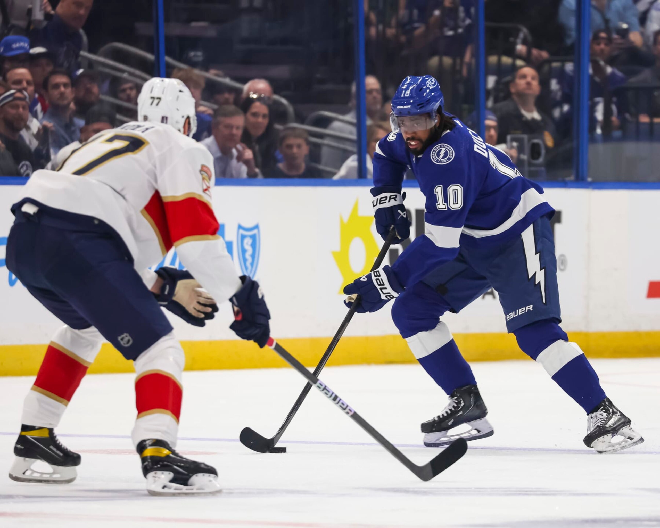 TAMPA, FL - APRIL 25: Anthony Duclair #10 of the Tampa Bay Lightning skates against Niko Mikkola #77 of the Florida Panthers in Game Three of the First Round of the 2024 Stanley Cup Playoffs at Amalie Arena on April 25, 2024 in Tampa, Florida. (Photo by Mark LoMoglio/NHLI via Getty Images)