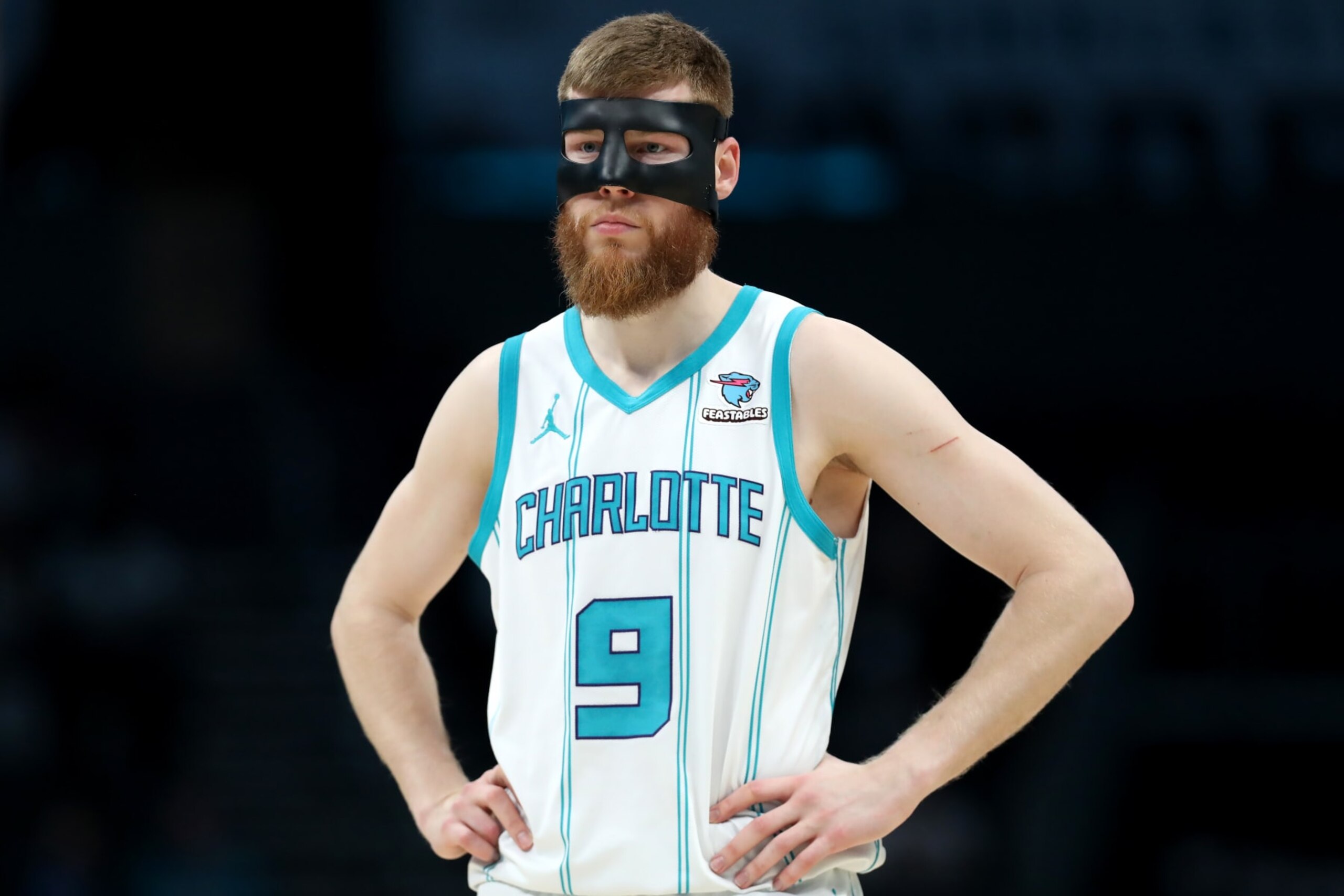 CHARLOTTE, NORTH CAROLINA - APRIL 03: Davis Bertans #9 of the Charlotte Hornets looks on during the first half against the Portland Trail Blazers at Spectrum Center on April 03, 2024 in Charlotte, North Carolina. NOTE TO USER: User expressly acknowledges and agrees that, by downloading and or using this photograph, User is consenting to the terms and conditions of the Getty Images License Agreement. (Photo by David Jensen/Getty Images)