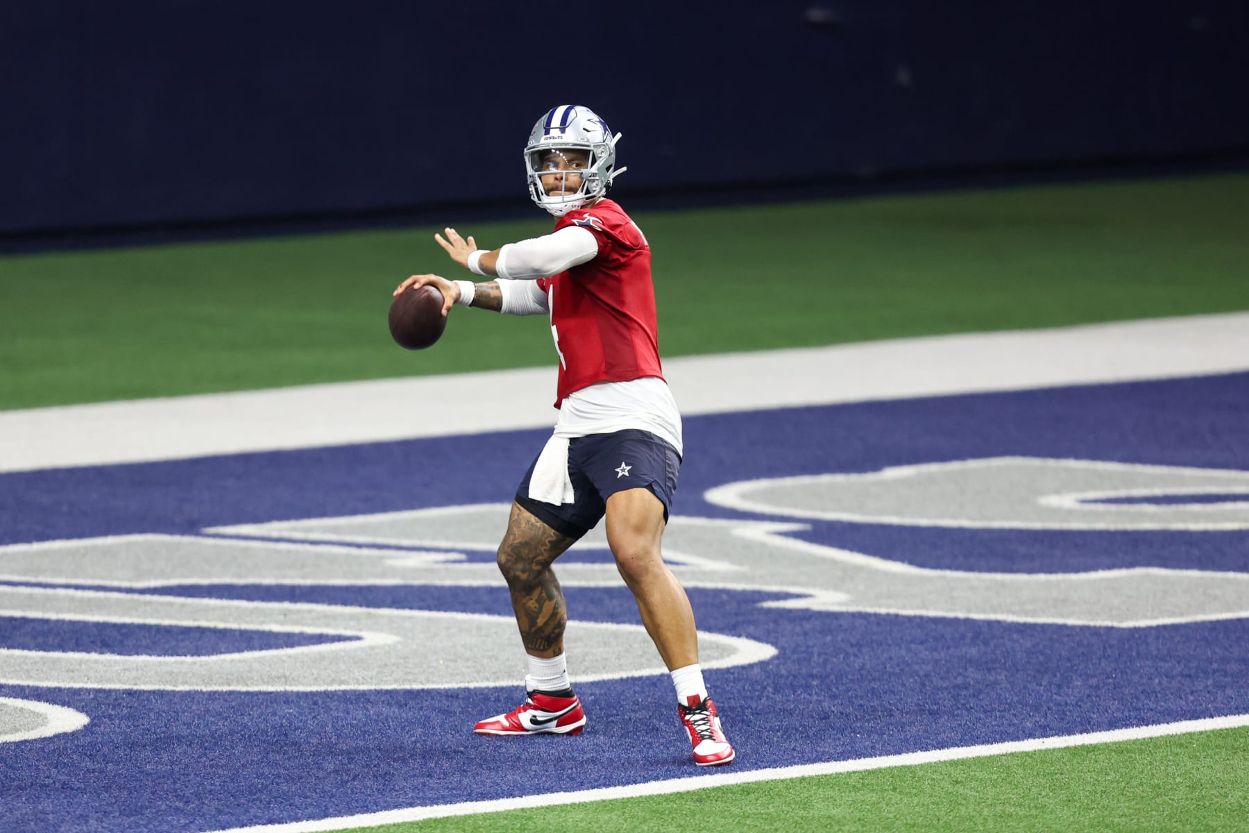 FRISCO, TX - MAY 22: Dallas Cowboys quarterback Dak Prescott (4) passes during the Dallas Cowboys OTAs on May 22, 2024 at The Star in Frisco, TX. (Photo by George Walker/Icon Sportswire via Getty Images)