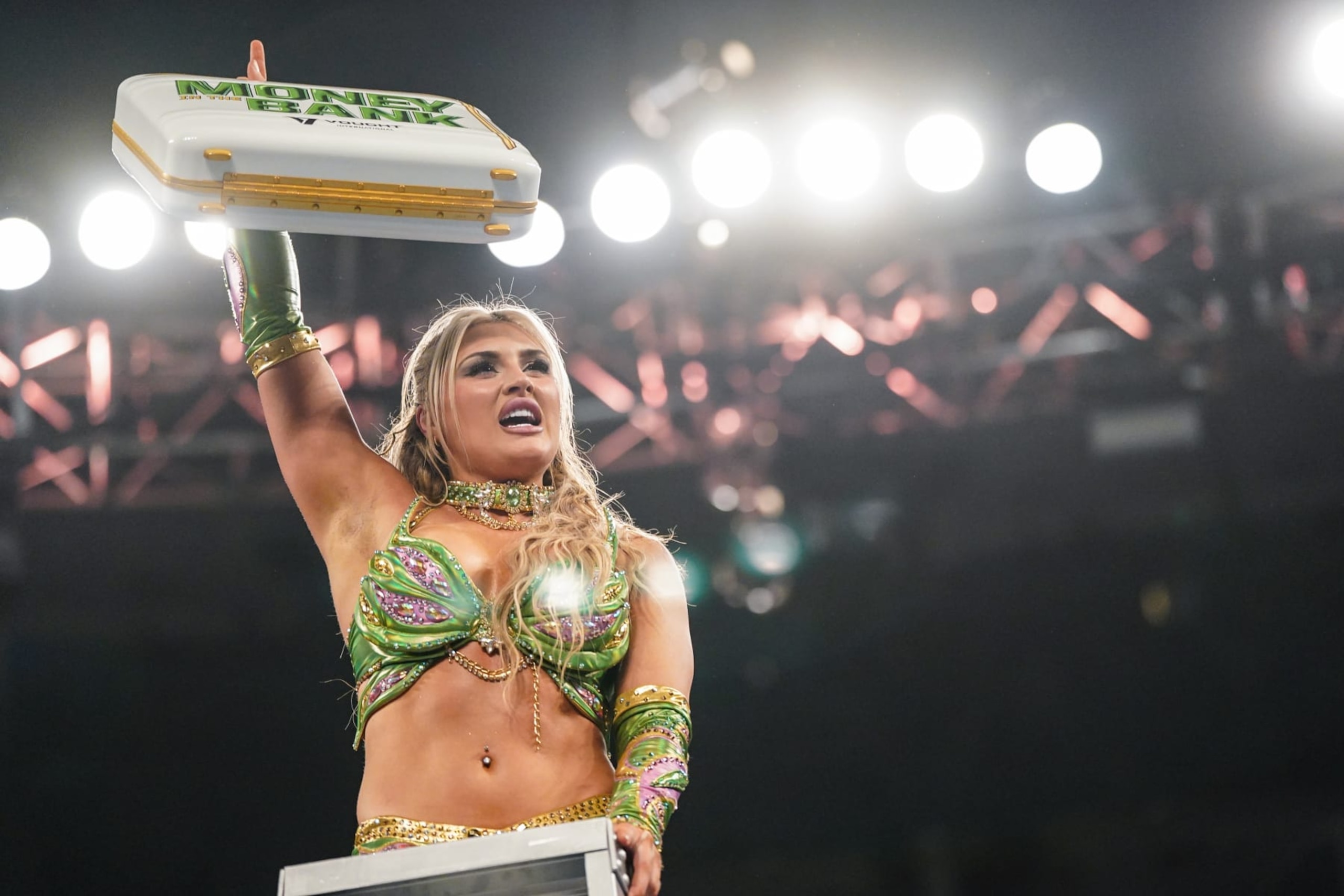 TORONTO, CANADA - JULY 6: Tiffany Stratton celebrates her win during Money in the Bank at Scotiabank Arena on July 6, 2024 in Toronto, Ontario. (Photo by WWE/Getty Images) TORONTO, CANADA - JULY 6: Tiffany Stratton celebrates her win during Money in the Bank at Scotiabank Arena on July 6, 2024 in Toronto, Ontario. (Photo by WWE/Getty Images)