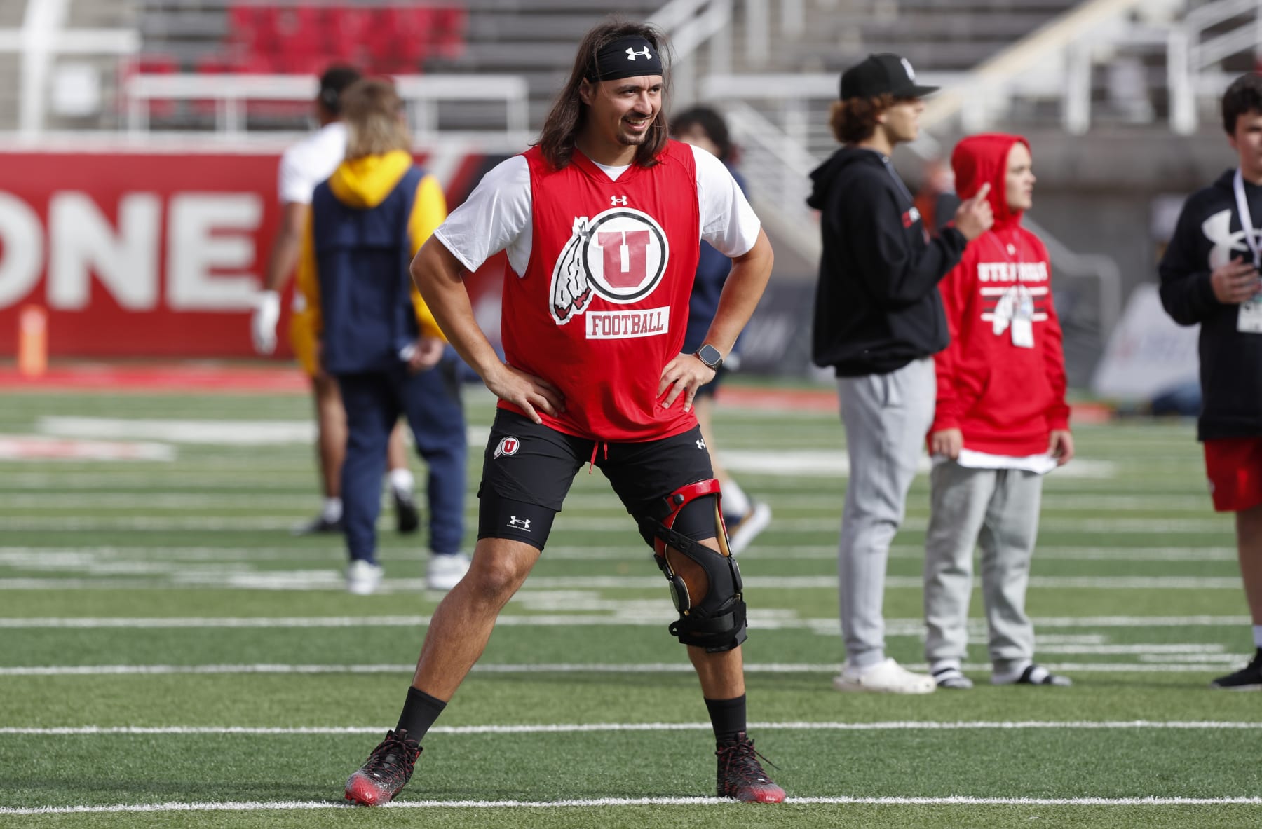 SALT LAKE CITY, UT - OCTOBER 14: Cameron Rising #7 of the Utah Utes sports a knee brace as stretches during warmups before their game against the California Golden Bears at Rice-Eccles Stadium October 14, 2023 in Salt Lake City, Utah. (Photo by Chris Gardner/Getty Images)
