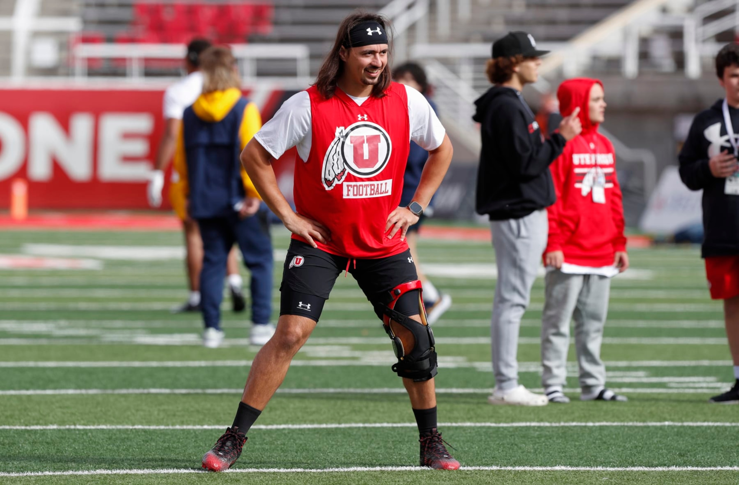 SALT LAKE CITY, UT - OCTOBER 14: Cameron Rising #7 of the Utah Utes sports a knee brace as stretches during warmups before their game against the California Golden Bears at Rice-Eccles Stadium October 14, 2023 in Salt Lake City, Utah. (Photo by Chris Gardner/Getty Images)