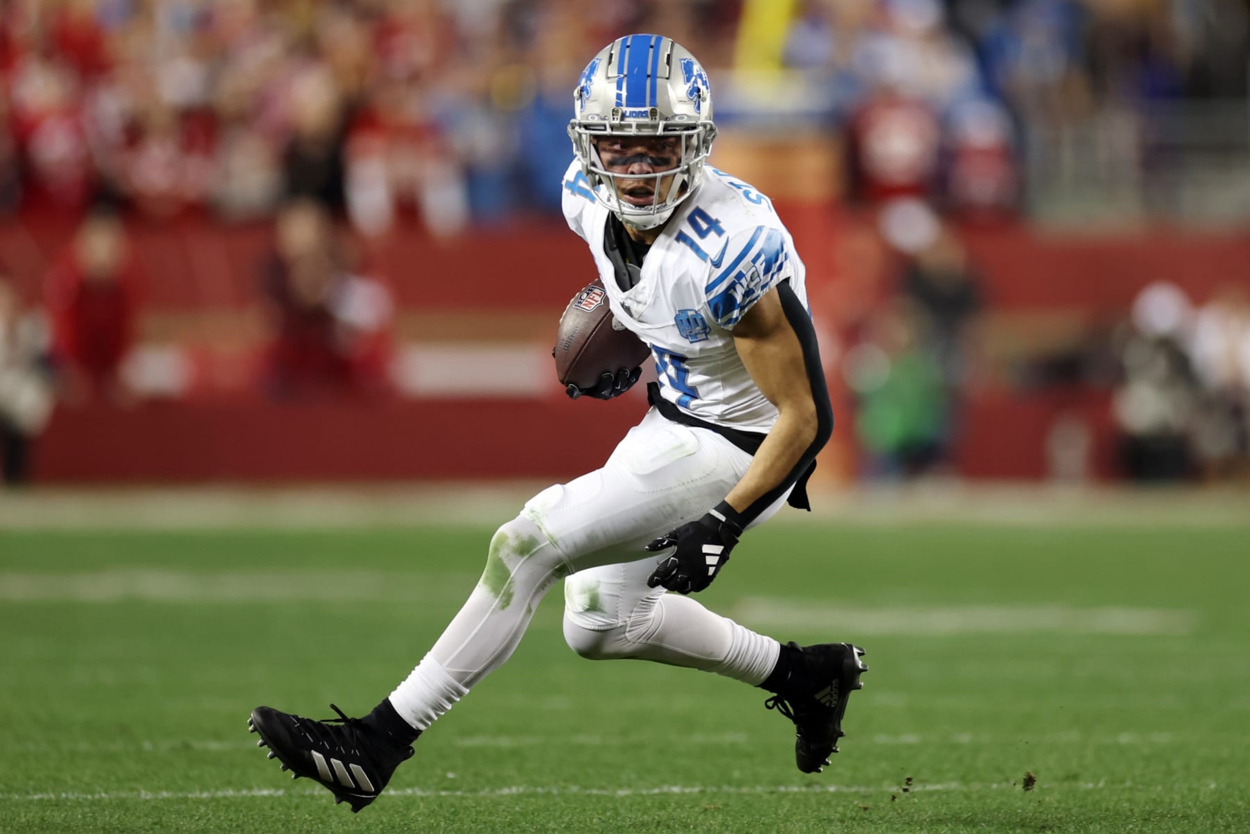 SANTA CLARA, CALIFORNIA - JANUARY 28: Amon-Ra St. Brown #14 of the Detroit Lions catches a pass during the second half against the San Francisco 49ers in the NFC Championship Game at Levi's Stadium on January 28, 2024 in Santa Clara, California. (Photo by Ezra Shaw/Getty Images) SANTA CLARA, CALIFORNIA - JANUARY 28: Amon-Ra St. Brown #14 of the Detroit Lions catches a pass during the second half against the San Francisco 49ers in the NFC Championship Game at Levi's Stadium on January 28, 2024 in Santa Clara, California. (Photo by Ezra Shaw/Getty Images)