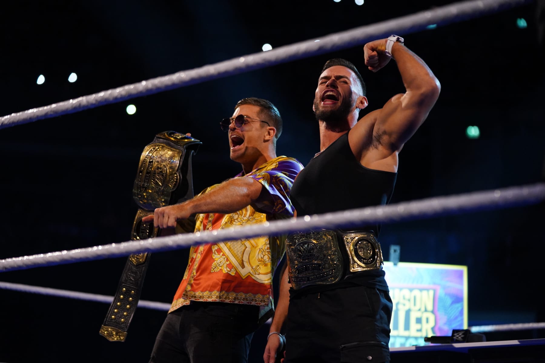 GLASGOW, SCOTLAND - JUNE 14: Grayson Waller and Austin Theory with the WWE Tag Team Championships during SmackDown at The OVO Hydro on June 14, 2024 in Glasgow, Scotland.  (Photo by WWE/Getty Images)