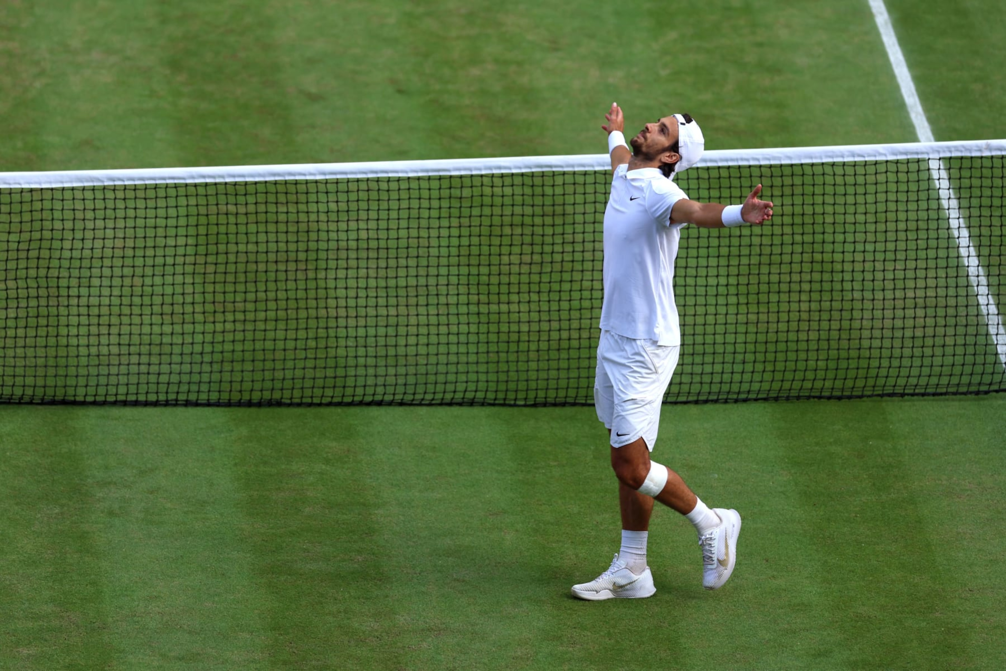 LONDON, ENGLAND - JULY 10: Lorenzo Musetti of Italy celebrates winning match point against Taylor Fritz of United States in the Gentlemen's Singles Quarter Final match during day ten of The Championships Wimbledon 2024 at All England Lawn Tennis and Croquet Club on July 10, 2024 in London, England. (Photo by Sean M. Haffey/Getty Images) LONDON, ENGLAND - JULY 10: Lorenzo Musetti of Italy celebrates winning match point against Taylor Fritz of United States in the Gentlemen's Singles Quarter Final match during day ten of The Championships Wimbledon 2024 at All England Lawn Tennis and Croquet Club on July 10, 2024 in London, England. (Photo by Sean M. Haffey/Getty Images)