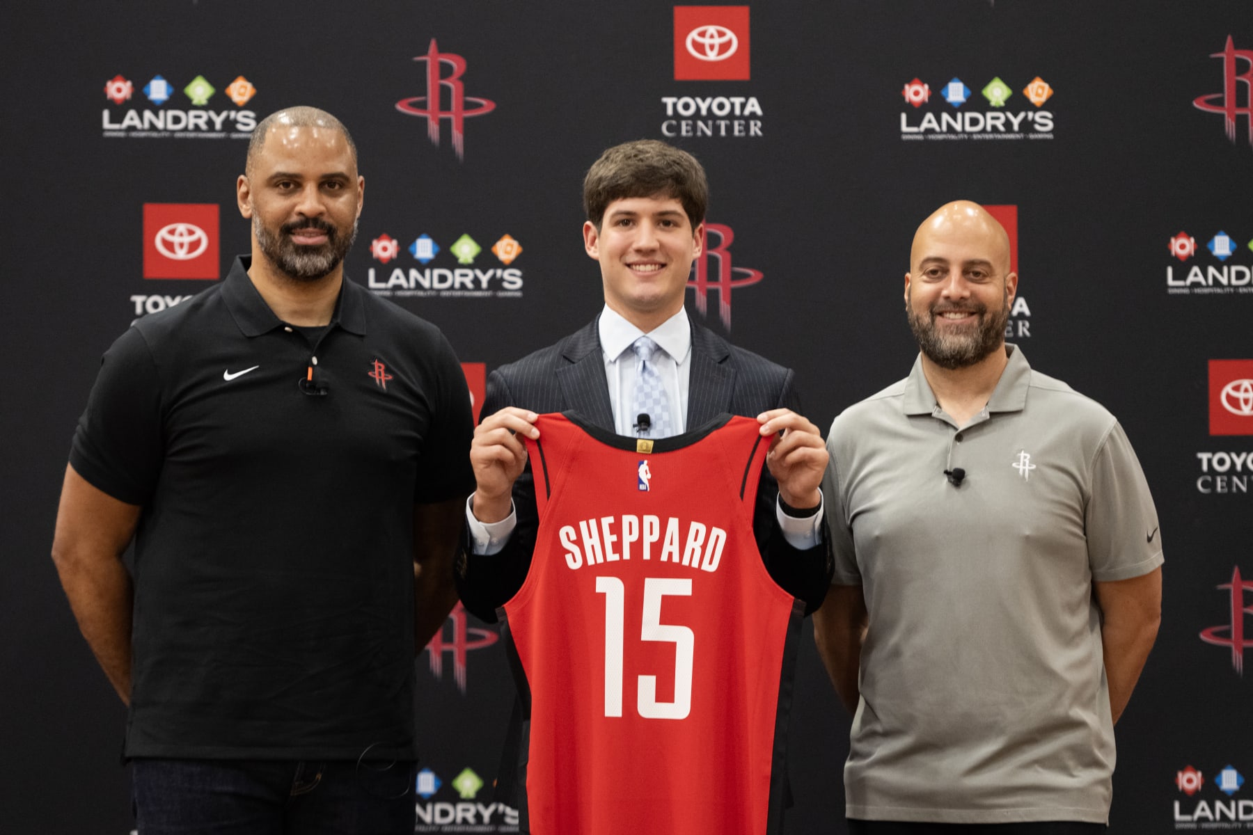 HOUSTON, TX - JULY 2: Head Coach Ime Udoka, Reed Sheppard #15 and General Manager Rafael Stone of the Houston Rockets pose for a photo during a press conference on July 2, 2024 at the Toyota Center in Houston, Texas. NOTE TO USER: User expressly acknowledges and agrees that, by downloading and or using this photograph, User is consenting to the terms and conditions of the Getty Images License Agreement. Mandatory Copyright Notice: Copyright 2024 NBAE (Photo by Logan Riely/NBAE via Getty Images)