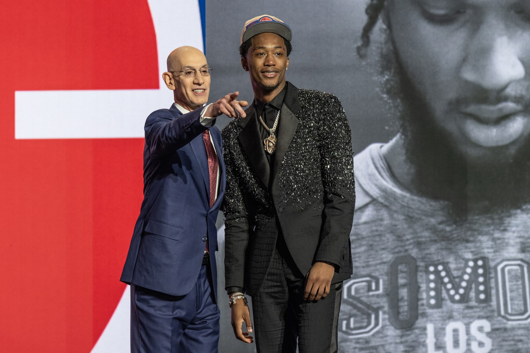 NEW YORK, UNITED STATES - JUNE 26: Commissioner Adam Silver shakes hands with Ron Holland II, selected as number five by the Detroit Pistons, in the first round of the 2024 NBA Draft at the Barclays Center in Brooklyn, New York on June 26, 2024 (Photo by Lev Radin/Anadolu via Getty Images)