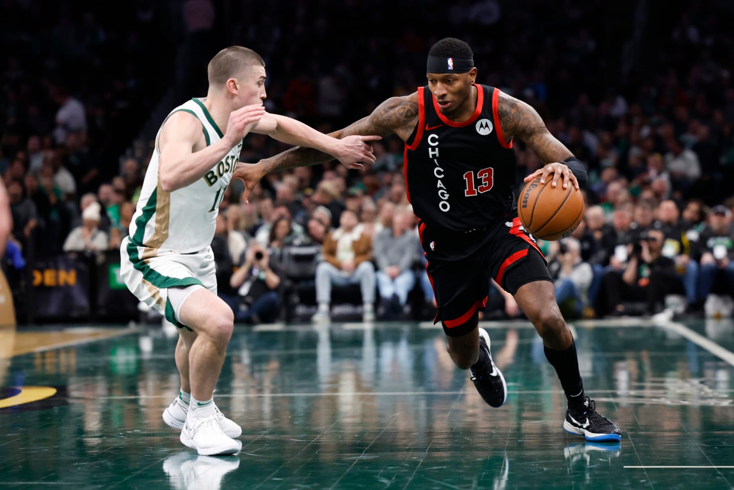 Boston, MA - November 28: Boston Celtics PG Payton Pritchard defends Chicago Bulls SF Torrey Craig in the first quarter. The Celtics beat the Bulls, 124-97. (Photo by Danielle Parhizkaran/The Boston Globe via Getty Images)