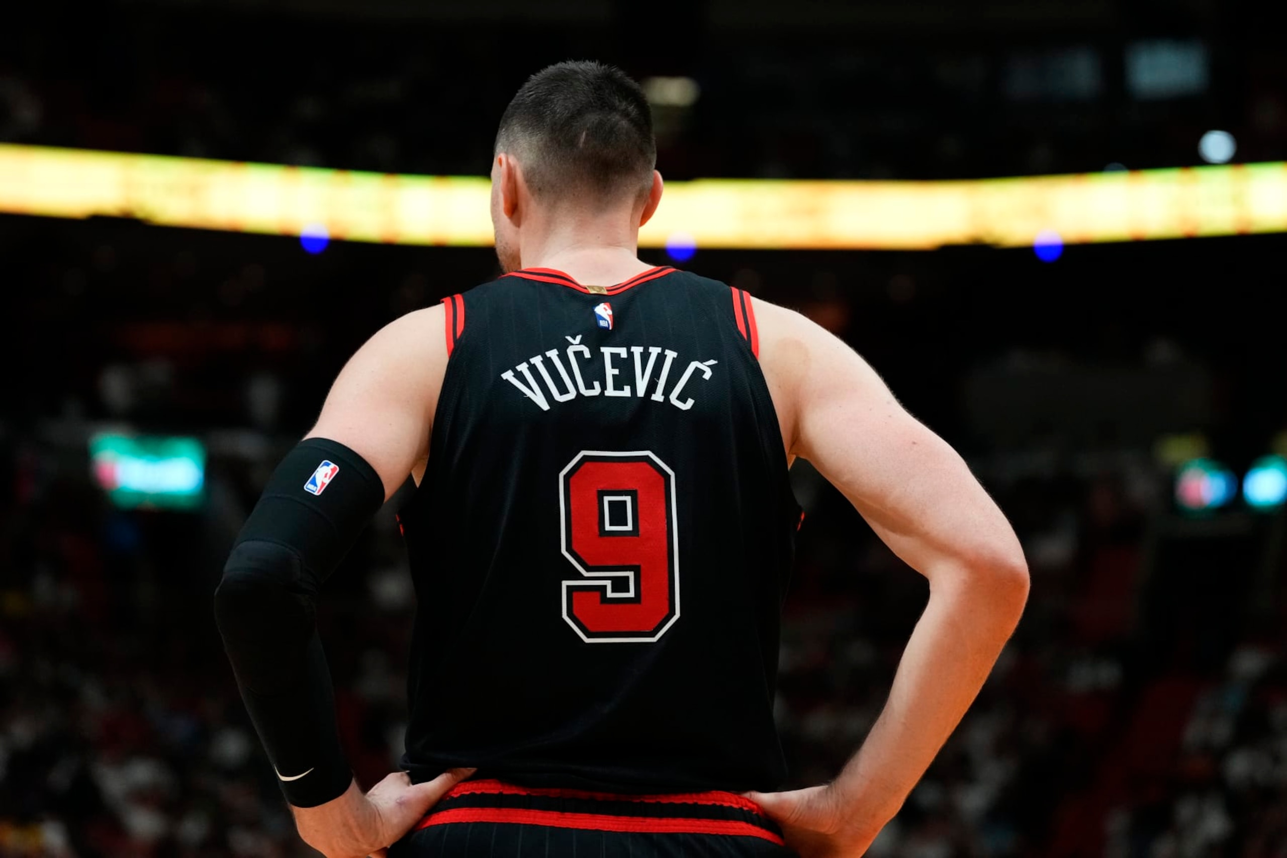 MIAMI, FLORIDA - APRIL 19: Nikola Vucevic #9 of the Chicago Bulls looks on against the Miami Heat in the fourth quarter during the Play-In Tournament at Kaseya Center on April 19, 2024 in Miami, Florida. NOTE TO USER: User expressly acknowledges and agrees that, by downloading and or using this photograph, User is consenting to the terms and conditions of the Getty Images License Agreement. (Photo by Rich Storry/Getty Images)