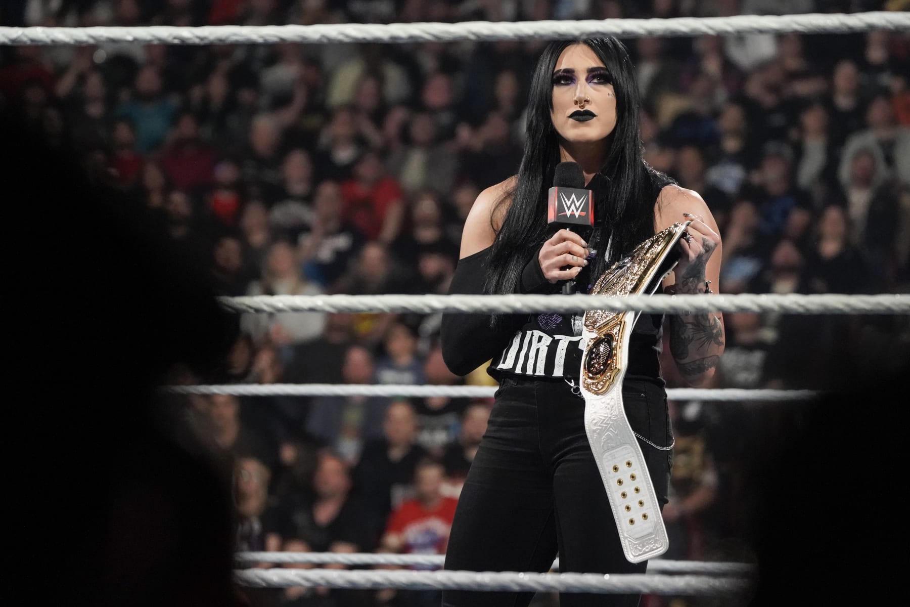 MONTREAL, CANADA - APRIL 15: Rhea Ripley relinquishes the Women's World Championship during Monday Night RAW at the Bell Centre on April 15, 2024 in Montreal, Canada.  (Photo by WWE/Getty Images)