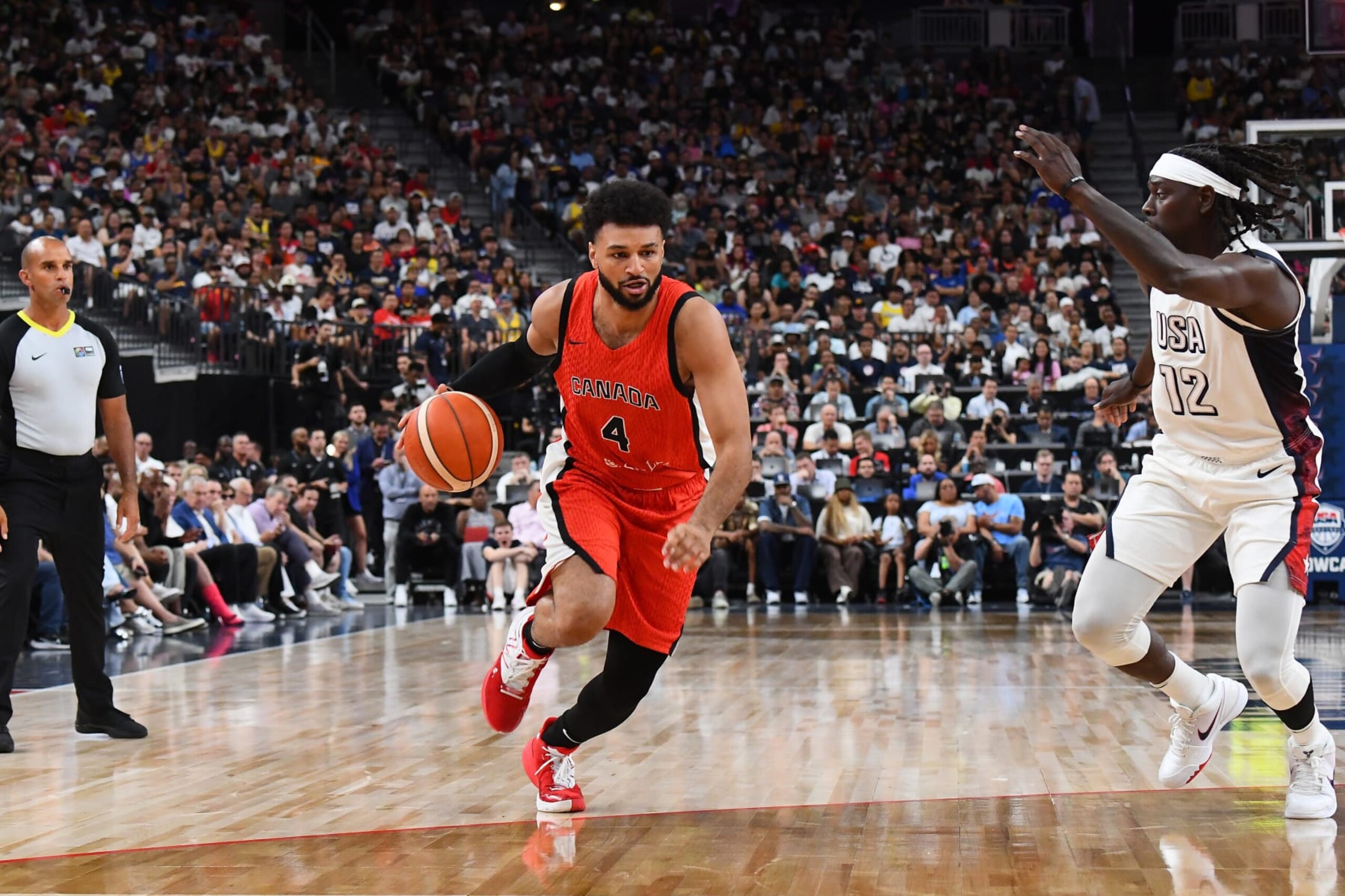 LAS VEGAS, NV - JULY 10: Jamal Murray #4 of the Canada Men's Basketball Team dribbles the ball during the game against the USA Basketball Men's Team on July 10, 2024 at the T-Mobile Arena in Las Vegas, Nevada. NOTE TO USER: User expressly acknowledges and agrees that, by downloading and/or using this Photograph, user is consenting to the terms and conditions of the Getty Images License Agreement. Mandatory Copyright Notice: Copyright 2024 NBAE (Photo by Brian Babineau/NBAE via Getty Images)