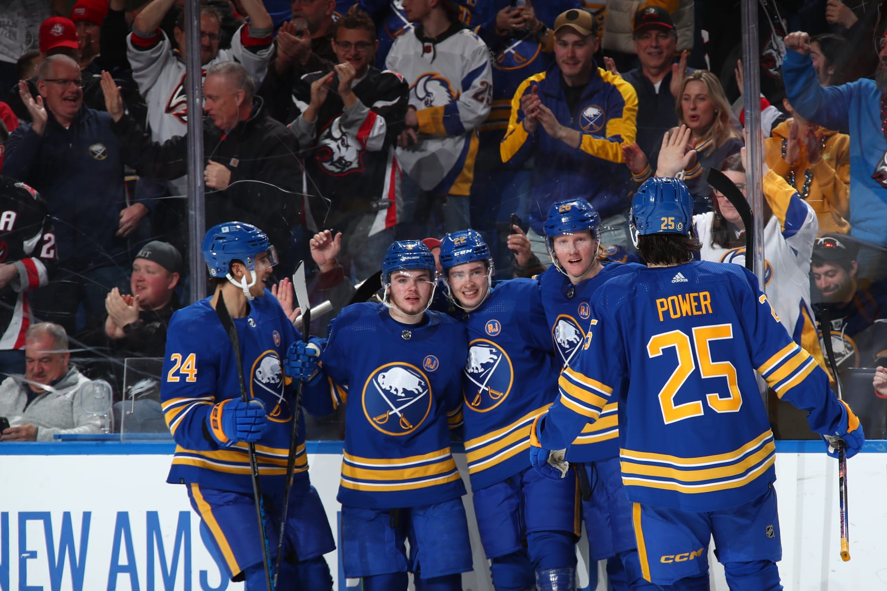 BUFFALO, NEW YORK - APRIL 5: Jack Quinn #22 of the Buffalo Sabres celebrates his second goal of the game against the Philadelphia Flyers with Dylan Cozens #24, Zach Benson #9, Rasmus Dahlin #26 and Owen Power #25 during an NHL game on April 5, 2024 at KeyBank Center in Buffalo, New York. (Photo by Bill Wippert/NHLI via Getty Images)