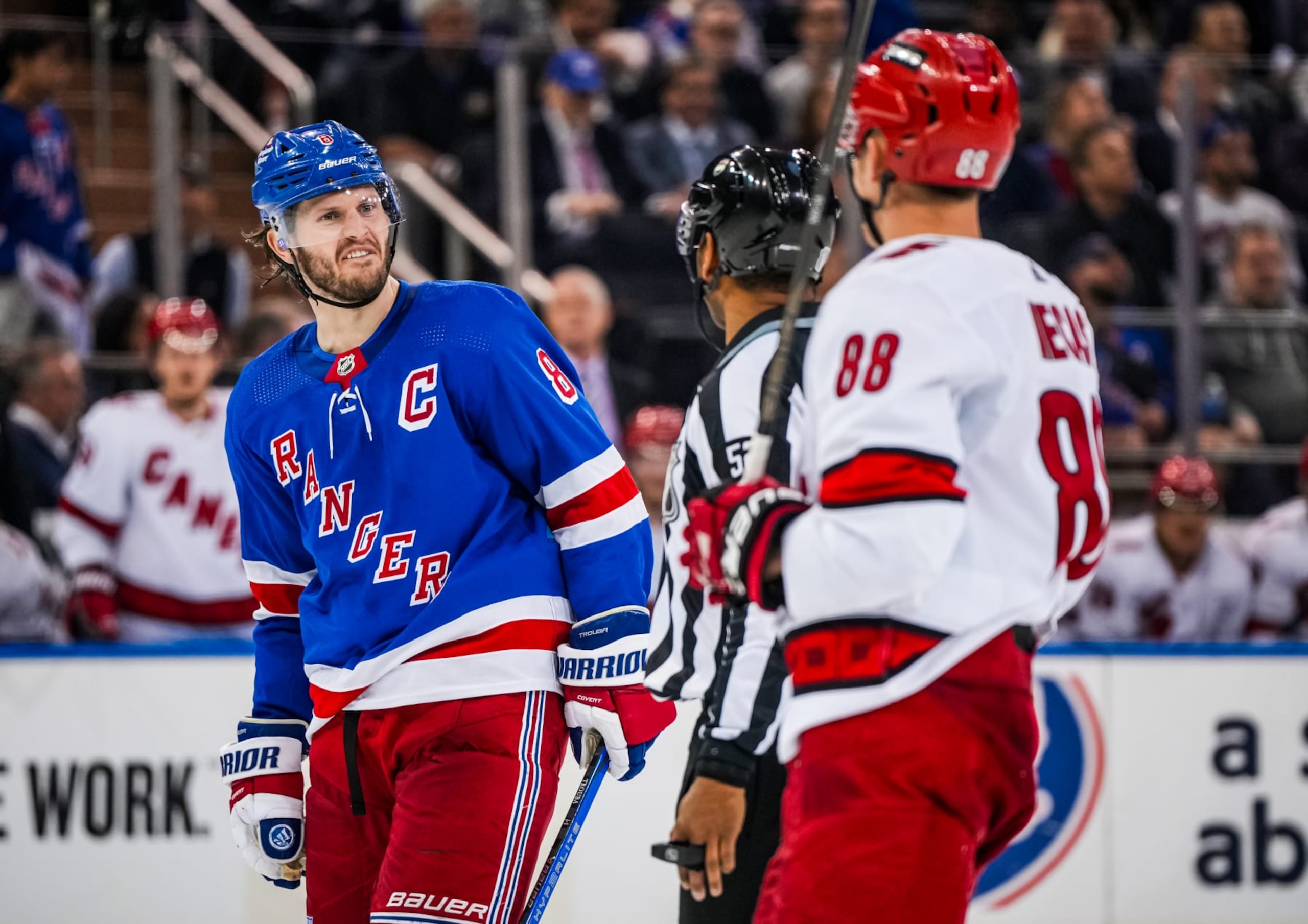 NEW YORK, NEW YORK - MAY 07: Jacob Trouba #8 of the New York Rangers has words with Martin Necas #88 of the Carolina Hurricanes during overtime in Game Two of the Second Round of the 2024 Stanley Cup Playoffs at Madison Square Garden on May 07, 2024 in New York City. (Photo by Josh Lavallee/NHLI via Getty Images) NEW YORK, NEW YORK - MAY 07: Jacob Trouba #8 of the New York Rangers has words with Martin Necas #88 of the Carolina Hurricanes during overtime in Game Two of the Second Round of the 2024 Stanley Cup Playoffs at Madison Square Garden on May 07, 2024 in New York City. (Photo by Josh Lavallee/NHLI via Getty Images)