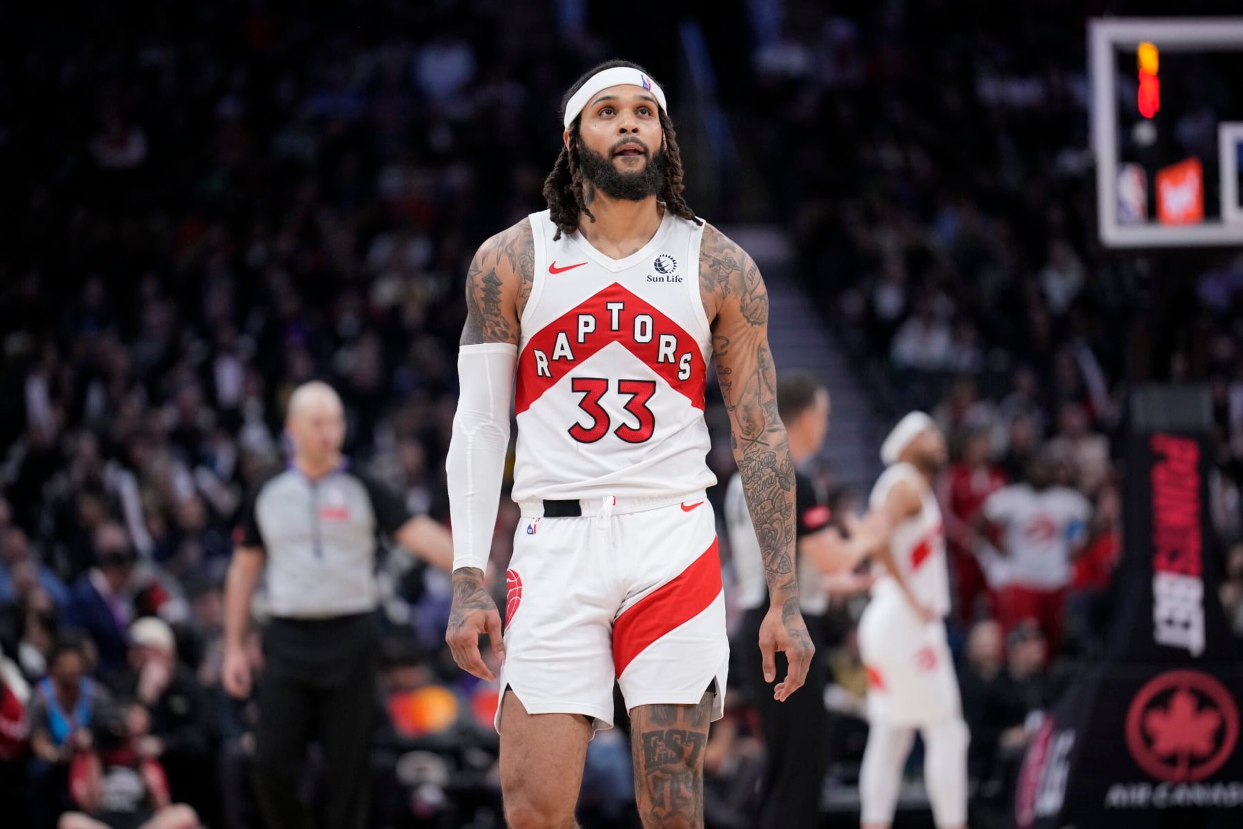 TORONTO, ON - MARCH 25: Gary Trent Jr. #33 of the Toronto Raptors looks on against the Brooklyn Nets during the second half of their basketball game at the Scotiabank Arena on March 25, 2024 in Toronto, Ontario, Canada. NOTE TO USER: User expressly acknowledges and agrees that, by downloading and/or using this Photograph, user is consenting to the terms and conditions of the Getty Images License Agreement. (Photo by Mark Blinch/Getty Images) TORONTO, ON - MARCH 25: Gary Trent Jr. #33 of the Toronto Raptors looks on against the Brooklyn Nets during the second half of their basketball game at the Scotiabank Arena on March 25, 2024 in Toronto, Ontario, Canada. NOTE TO USER: User expressly acknowledges and agrees that, by downloading and/or using this Photograph, user is consenting to the terms and conditions of the Getty Images License Agreement. (Photo by Mark Blinch/Getty Images)