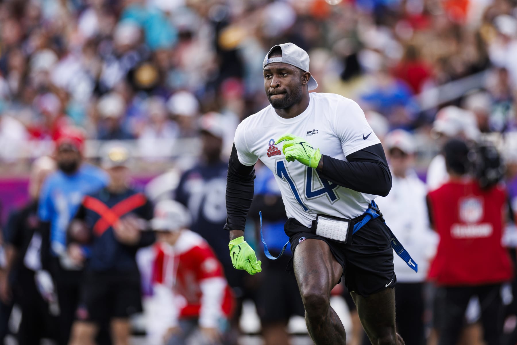 ORLANDO, FLORIDA - FEBRUARY 04: DK Metcalf #14 of the Seattle Seahawks and NFC runs a route during the 2024 NFL Pro Bowl at Camping World Stadium on February 04, 2024 in Orlando, Florida. (Photo by James Gilbert/Getty Images)