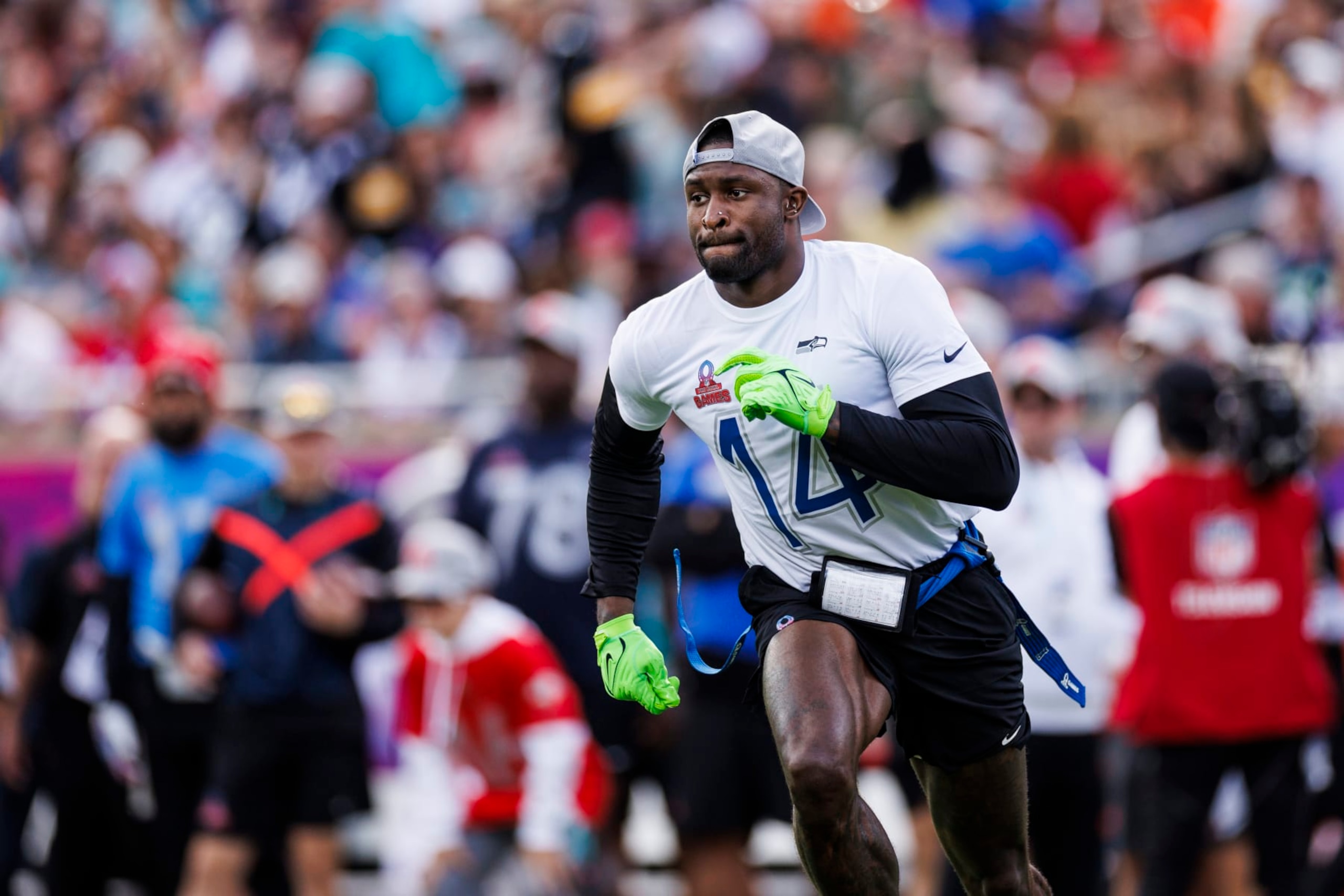 ORLANDO, FLORIDA - FEBRUARY 04: DK Metcalf #14 of the Seattle Seahawks and NFC runs a route during the 2024 NFL Pro Bowl at Camping World Stadium on February 04, 2024 in Orlando, Florida. (Photo by James Gilbert/Getty Images)