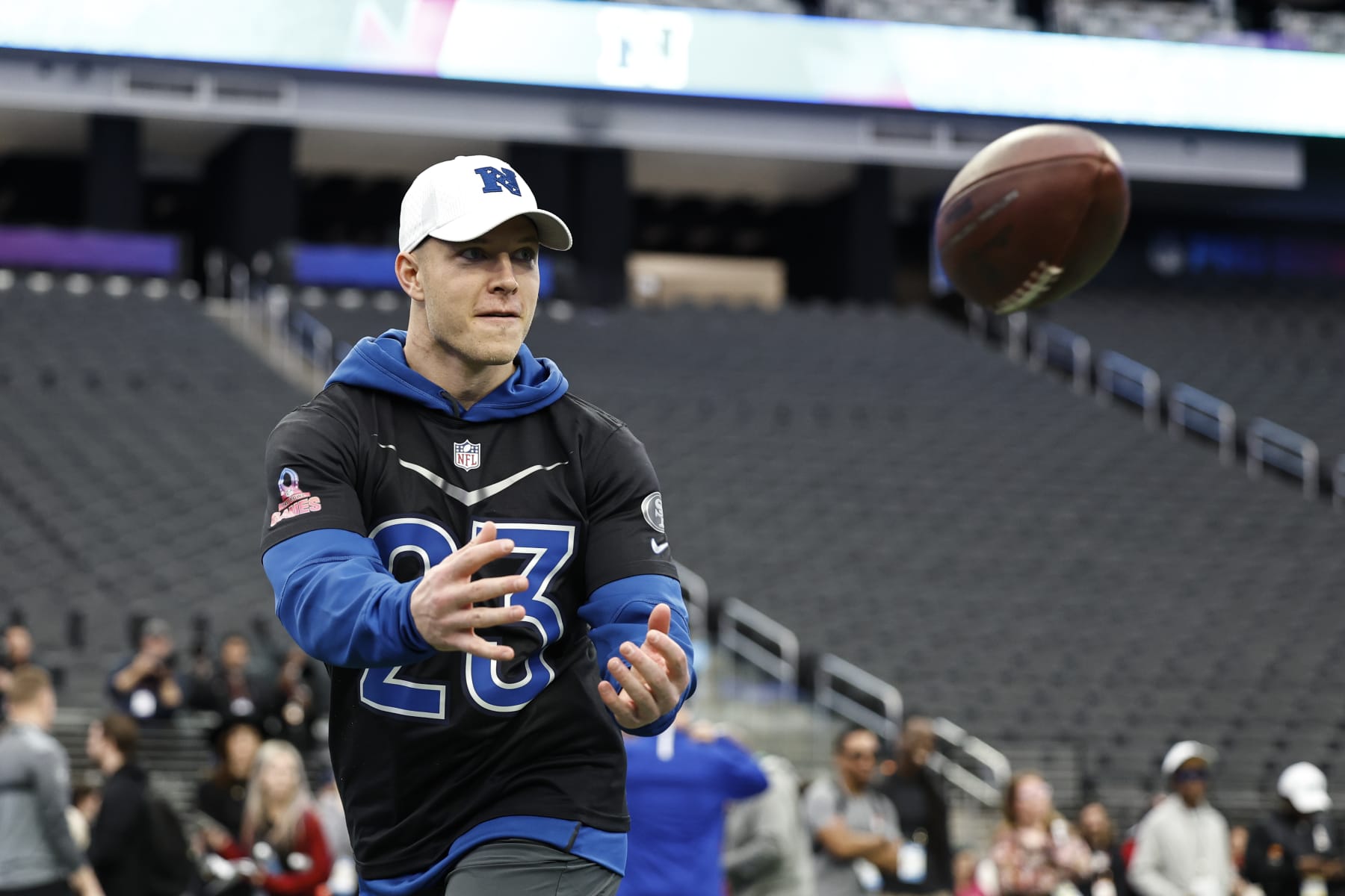 LAS VEGAS, NEVADA - FEBRUARY 04: NFC running back Christian McCaffrey #23 of the San Francisco 49ers completes a pass during a practice session prior to an NFL Pro Bowl football game at Allegiant Stadium on February 04, 2023 in Las Vegas, Nevada. (Photo by Michael Owens/Getty Images)