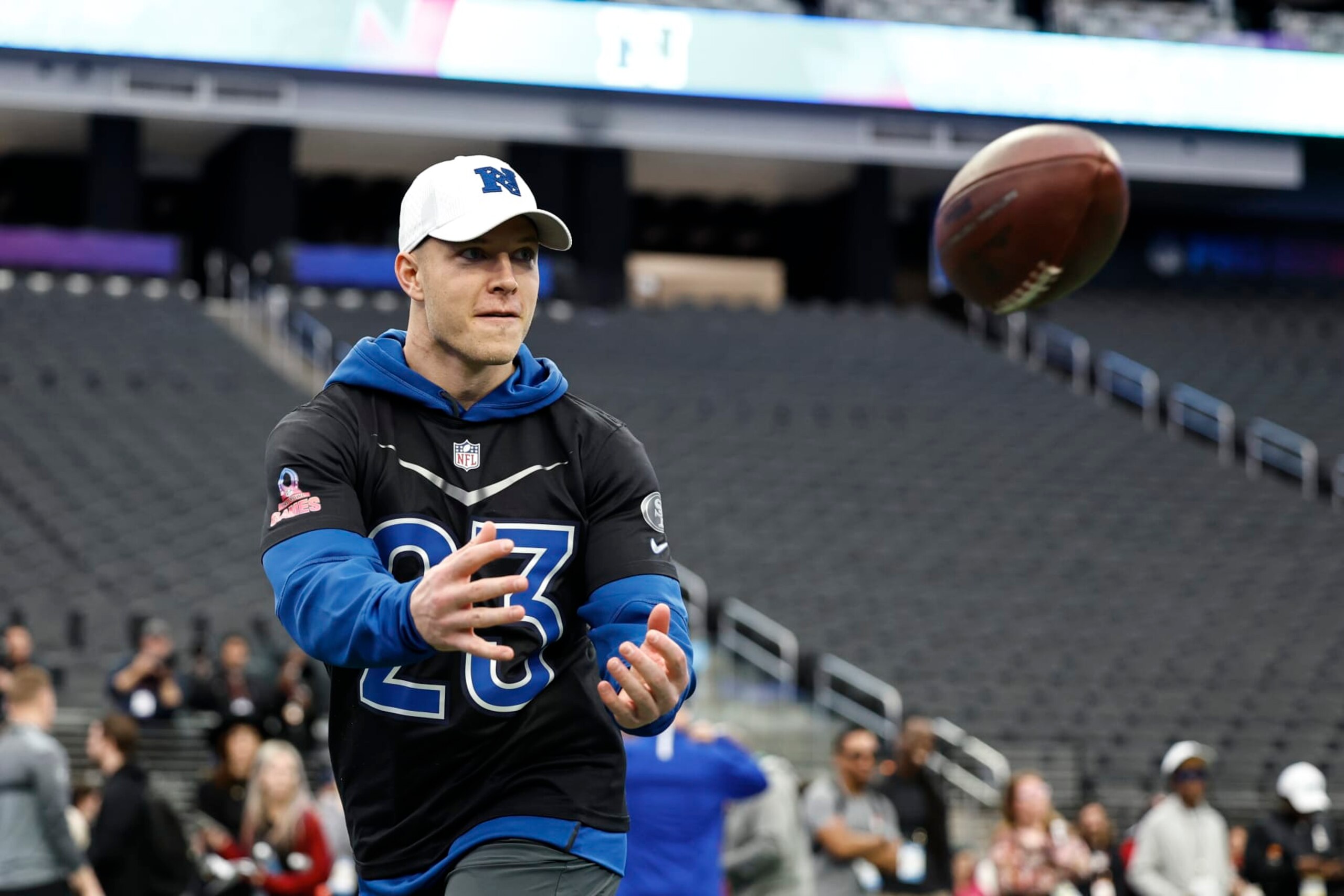 LAS VEGAS, NEVADA - FEBRUARY 04: NFC running back Christian McCaffrey #23 of the San Francisco 49ers completes a pass during a practice session prior to an NFL Pro Bowl football game at Allegiant Stadium on February 04, 2023 in Las Vegas, Nevada. (Photo by Michael Owens/Getty Images)