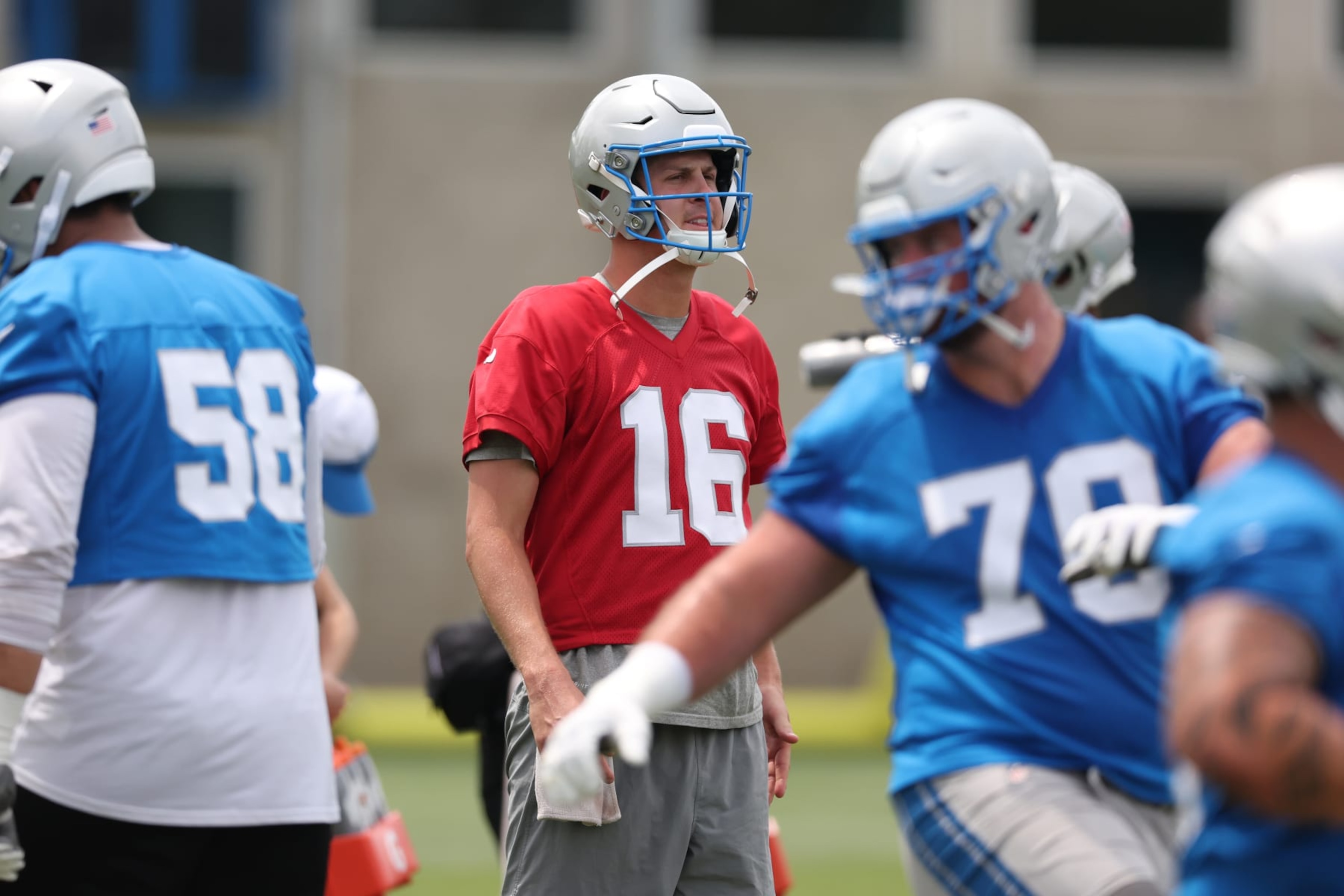 ALLEN PARK, MICHIGAN - JUNE 05: Jared Goff #16 of the Detroit Lions looks on during mandatory mini camp at the Detroit Lions Headquarters and Training Facility on June 05, 2024 in Allen Park, Michigan. (Photo by Gregory Shamus/Getty Images)