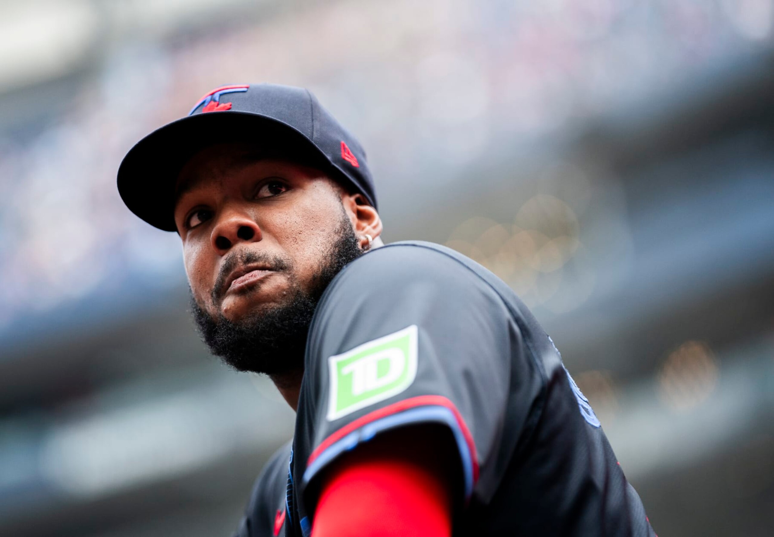 TORONTO, ON - JULY 3: Vladimir Guerrero Jr. #27 of Toronto Blue Jays looks on from the dugout before playing the Houston Astros in their MLB game at the Rogers Centre on July 3, 2024 in Toronto, Ontario, Canada. (Photo by Mark Blinch/Getty Images)