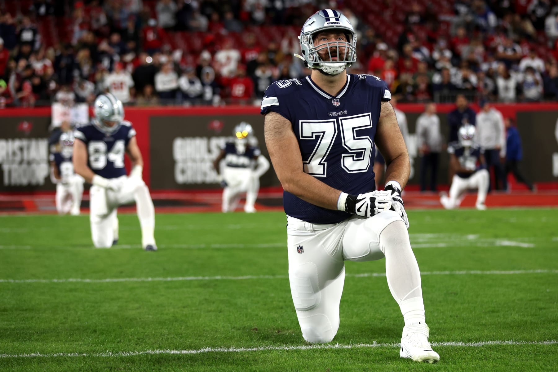 TAMPA, FLORIDA - JANUARY 16: Josh Ball #75 of the Dallas Cowboys warms up against the Tampa Bay Buccaneers prior to the NFC Wild Card Playoff game at Raymond James Stadium on January 16, 2023 in Tampa, Florida. (Perry Knotts/Getty Images)