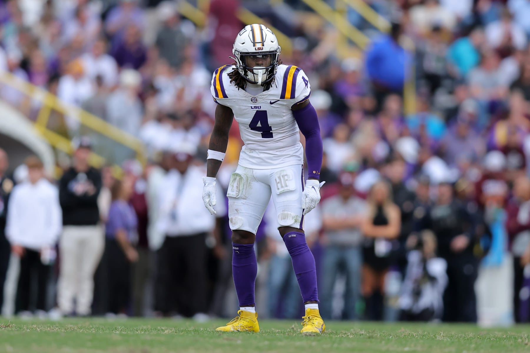 BATON ROUGE, LOUISIANA - NOVEMBER 25: Harold Perkins Jr. #4 of the LSU Tigers defends against the Texas A&M Aggies during a game at Tiger Stadium on November 25, 2023 in Baton Rouge, Louisiana. (Photo by Jonathan Bachman/Getty Images)