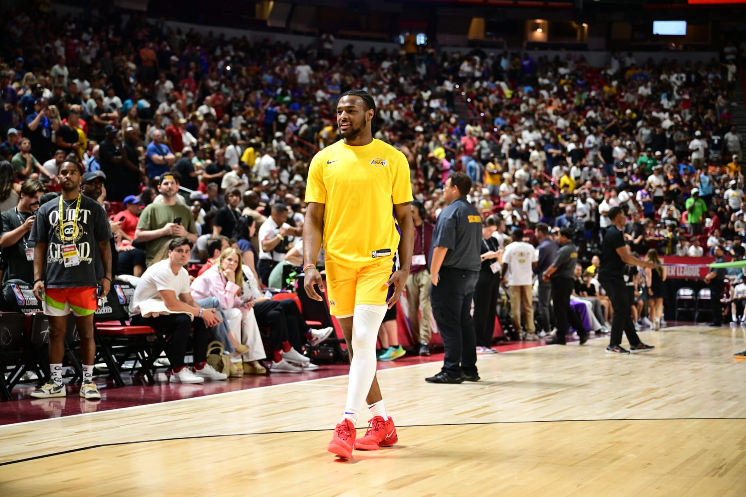LAS VEGAS, NV - JULY 12: Bronny James Jr. #9 of the Los Angeles Lakers warms up before the game against the Houston Rockets on July 12, 2024 at the Thomas & Mack Center in Las Vegas, Nevada. NOTE TO USER: User expressly acknowledges and agrees that, by downloading and or using this photograph, User is consenting to the terms and conditions of the Getty Images License Agreement. Mandatory Copyright Notice: Copyright 2024 NBAE (Photo by Adam Hagy/NBAE via Getty Images) LAS VEGAS, NV - JULY 12: Bronny James Jr. #9 of the Los Angeles Lakers warms up before the game against the Houston Rockets on July 12, 2024 at the Thomas & Mack Center in Las Vegas, Nevada. NOTE TO USER: User expressly acknowledges and agrees that, by downloading and or using this photograph, User is consenting to the terms and conditions of the Getty Images License Agreement. Mandatory Copyright Notice: Copyright 2024 NBAE (Photo by Adam Hagy/NBAE via Getty Images)