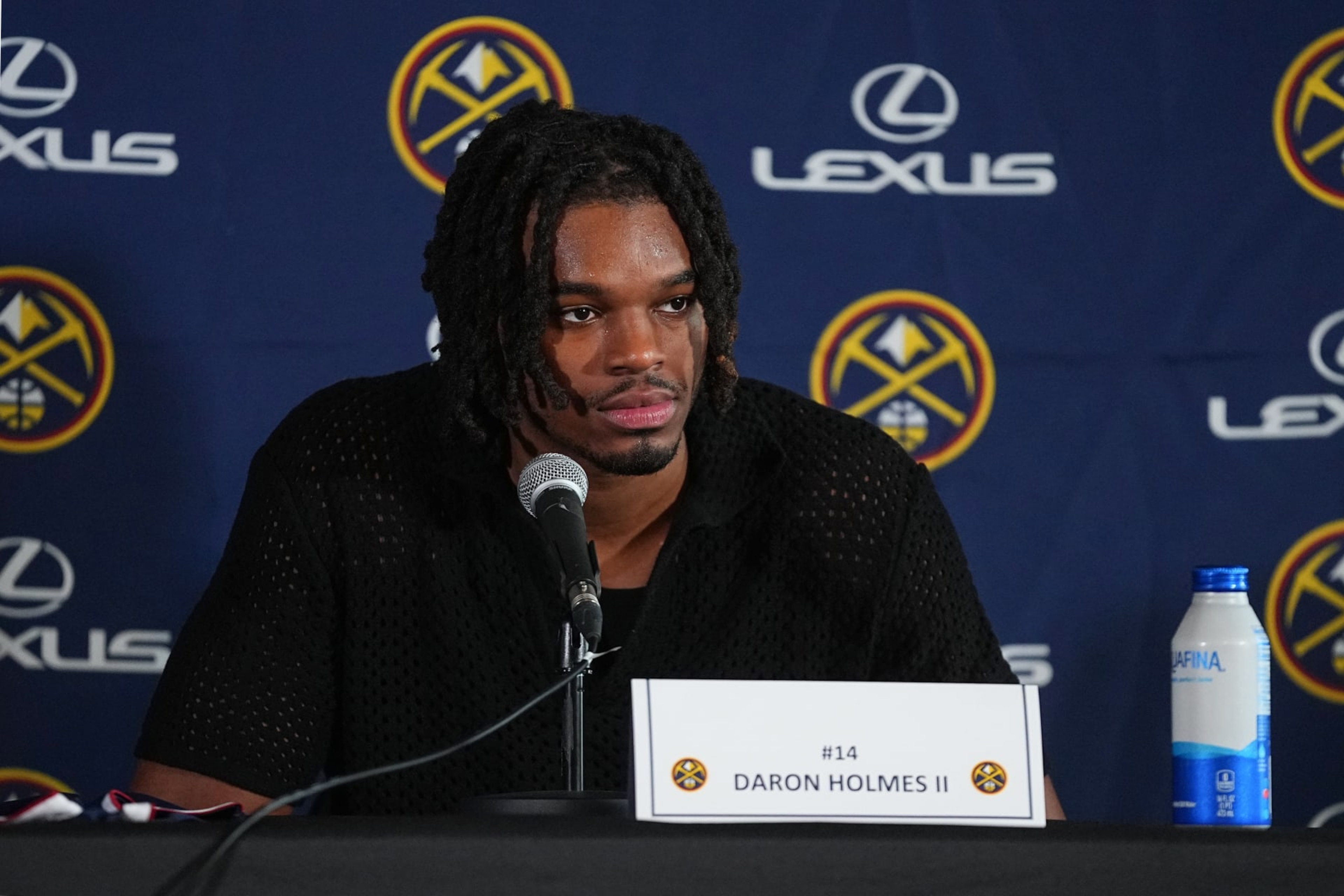DENVER, CO - JULY 1: The Denver Nuggets introduce Daron Holmes II during a press conference on July 1, 2024 at the Ball Arena in Denver, Colorado. NOTE TO USER: User expressly acknowledges and agrees that, by downloading and/or using this Photograph, user is consenting to the terms and conditions of the Getty Images License Agreement. Mandatory Copyright Notice: Copyright 2024 NBAE (Photo by Bart Young/NBAE via Getty Images) DENVER, CO - JULY 1: The Denver Nuggets introduce Daron Holmes II during a press conference on July 1, 2024 at the Ball Arena in Denver, Colorado. NOTE TO USER: User expressly acknowledges and agrees that, by downloading and/or using this Photograph, user is consenting to the terms and conditions of the Getty Images License Agreement. Mandatory Copyright Notice: Copyright 2024 NBAE (Photo by Bart Young/NBAE via Getty Images)