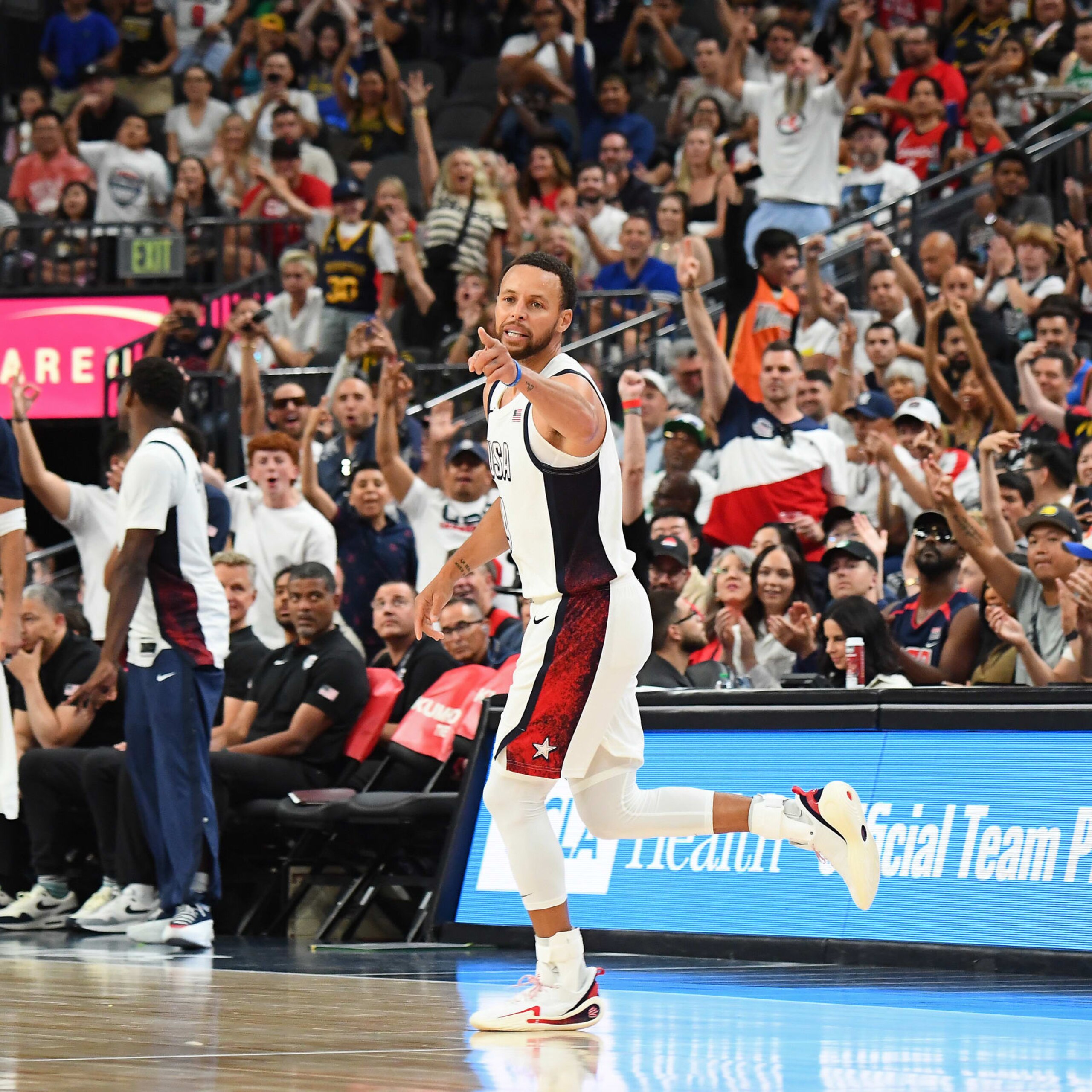 LAS VEGAS, NV - JULY 10: Stephen Curry #4 of the USA Basketball Men's Team celebrates during the game against the Canada Basketball Men's Team on July 10, 2024 at the T-Mobile Arena in Las Vegas, Nevada. NOTE TO USER: User expressly acknowledges and agrees that, by downloading and/or using this Photograph, user is consenting to the terms and conditions of the Getty Images License Agreement. Mandatory Copyright Notice: Copyright 2024 NBAE (Photo by Brian Babineau/NBAE via Getty Images)