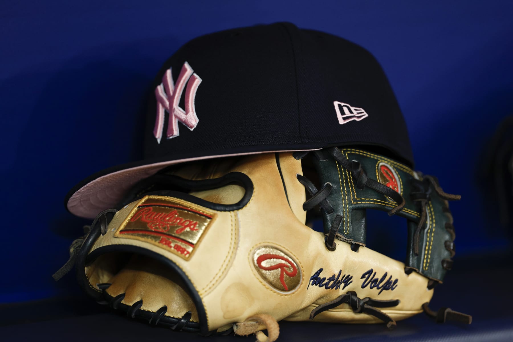 ST PETERSBURG, FLORIDA - MAY 12: General view of the hat and glove of Anthony Volpe #11 of the New York Yankees prior to the game /T at Tropicana Field on May 12, 2024 in St Petersburg, Florida. (Photo by Douglas P. DeFelice/Getty Images)