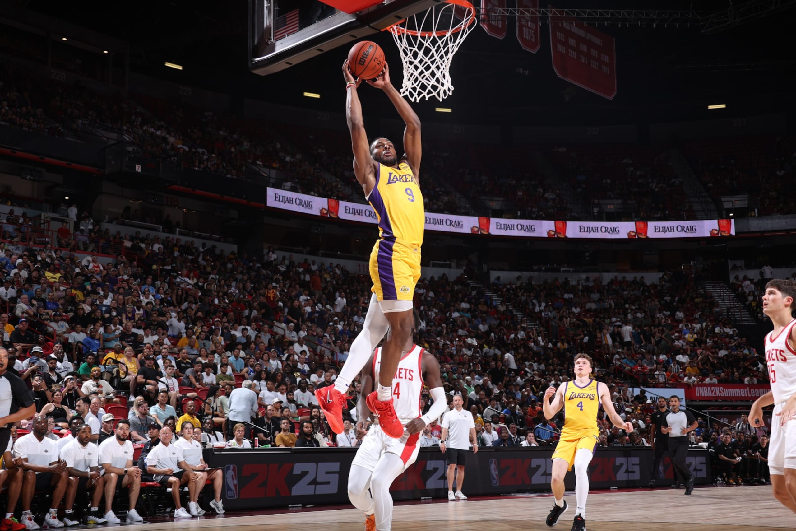 LAS VEGAS, NV - JULY 12: Bronny James Jr. #9 of the Los Angeles Lakers dunks the ball during the game against the Houston Rockets on July 12, 2024 at the Thomas & Mack Center in Las Vegas, Nevada. NOTE TO USER: User expressly acknowledges and agrees that, by downloading and or using this photograph, User is consenting to the terms and conditions of the Getty Images License Agreement. Mandatory Copyright Notice: Copyright 2024 NBAE (Photo by Stephen Gosling/NBAE via Getty Images)