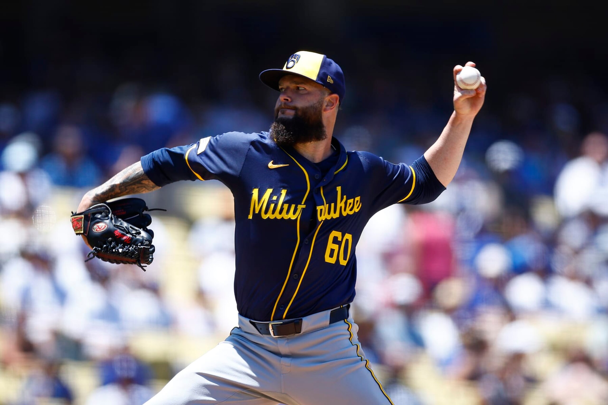 LOS ANGELES, CALIFORNIA - JULY 07:  Dallas Keuchel #60 of the Milwaukee Brewers throws against the Los Angeles Dodgers in the second inning at Dodger Stadium on July 07, 2024 in Los Angeles, California. (Photo by Ronald Martinez/Getty Images)
