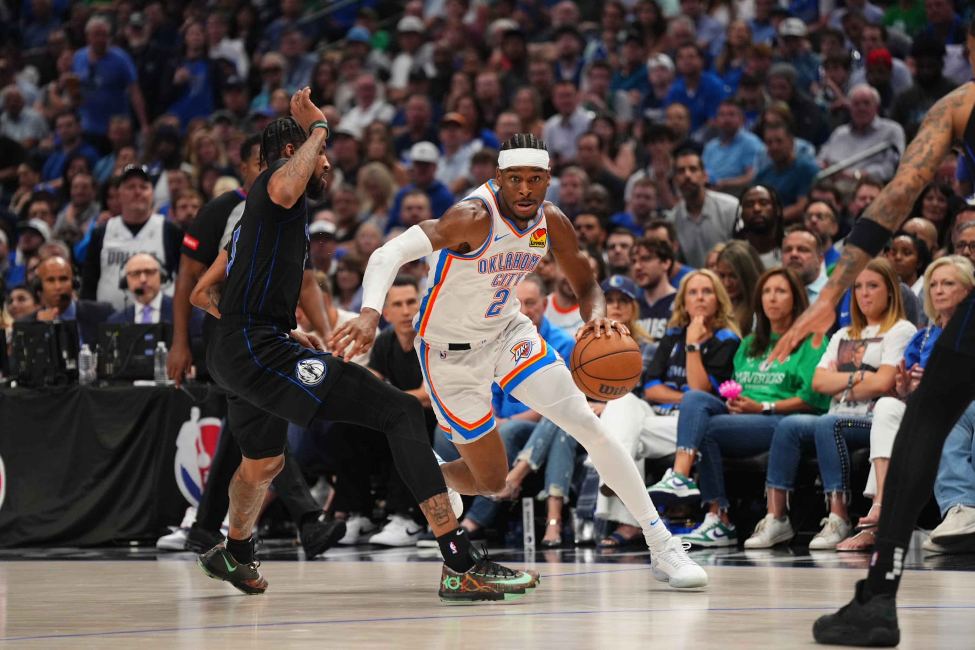DALLAS, TX - MAY 18: Shai Gilgeous-Alexander #2 of the Oklahoma City Thunder handles the ball during the game against the Dallas Mavericks during Round 2 Game 6 of the 2024 NBA Playoffs on May 18, 2024 at the American Airlines Center in Dallas, Texas. NOTE TO USER: User expressly acknowledges and agrees that, by downloading and or using this photograph, User is consenting to the terms and conditions of the Getty Images License Agreement. Mandatory Copyright Notice: Copyright 2024 NBAE (Photo by Cooper Neill/NBAE via Getty Images) DALLAS, TX - MAY 18: Shai Gilgeous-Alexander #2 of the Oklahoma City Thunder handles the ball during the game against the Dallas Mavericks during Round 2 Game 6 of the 2024 NBA Playoffs on May 18, 2024 at the American Airlines Center in Dallas, Texas. NOTE TO USER: User expressly acknowledges and agrees that, by downloading and or using this photograph, User is consenting to the terms and conditions of the Getty Images License Agreement. Mandatory Copyright Notice: Copyright 2024 NBAE (Photo by Cooper Neill/NBAE via Getty Images)