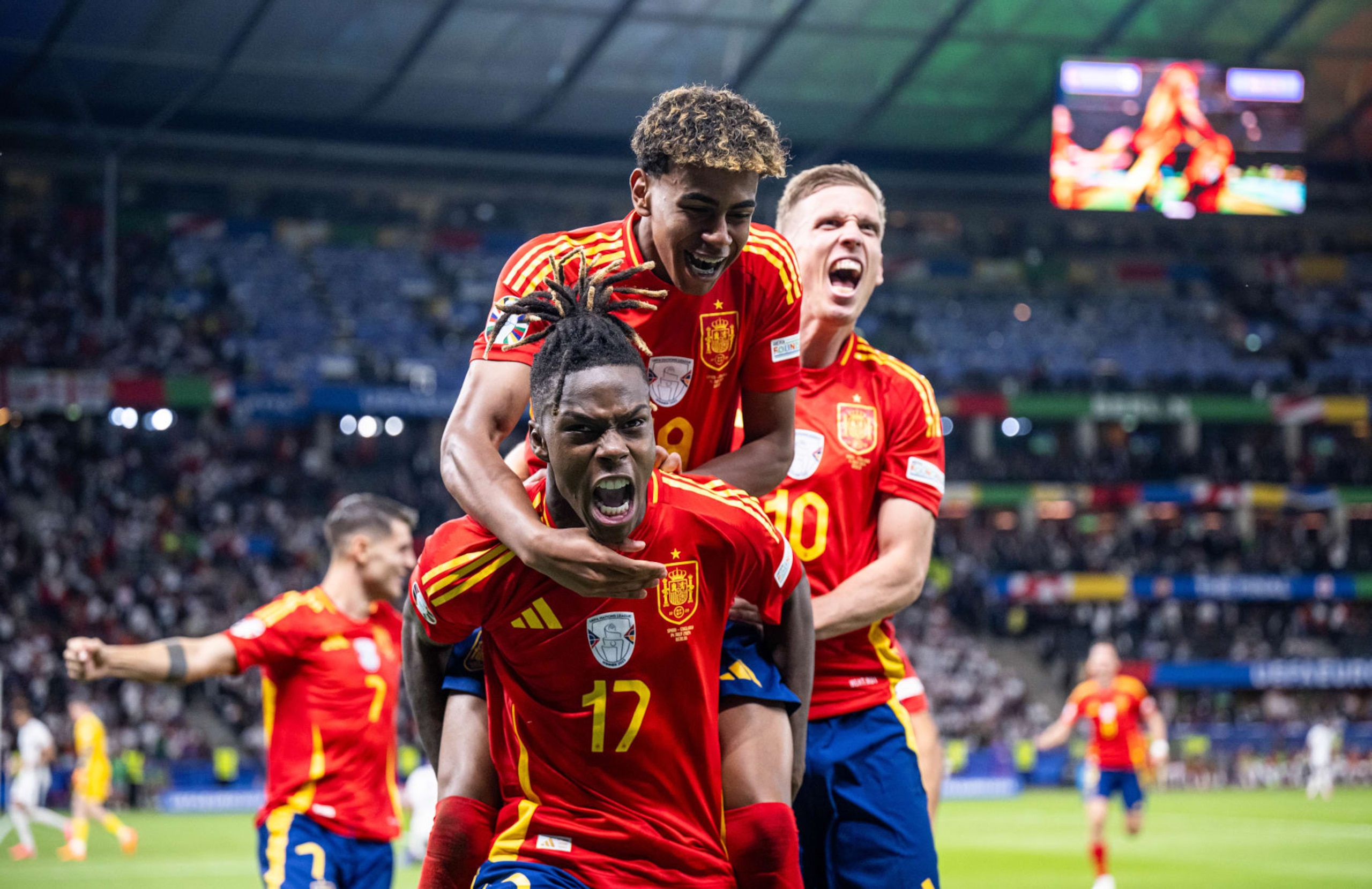 BERLIN, GERMANY - JULY 14: Nico Williams of Spain (17) celebrates after scoring his team's first goal with Lamine Yamal (19) during the UEFA EURO 2024 final match between Spain and England at Olympiastadion on July 14, 2024 in Berlin, Germany. (Photo by Marvin Ibo Guengoer - GES Sportfoto/Getty Images)