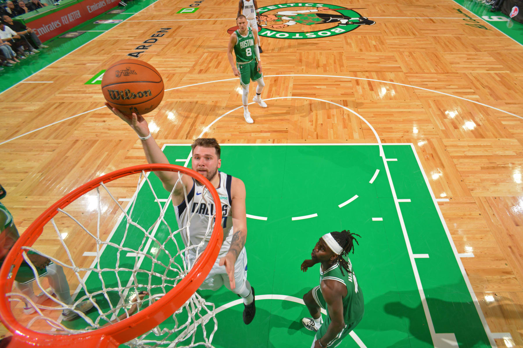 BOSTON, MA - JUNE 17: Luka Doncic #77 of the Dallas Mavericks drives to the basket during the game against the Boston Celtics during Game 5 of the 2024 NBA Finals on June 17, 2024 at the TD Garden in Boston, Massachusetts. NOTE TO USER: User expressly acknowledges and agrees that, by downloading and or using this photograph, User is consenting to the terms and conditions of the Getty Images License Agreement. Mandatory Copyright Notice: Copyright 2024 NBAE  (Photo by Jesse D. Garrabrant/NBAE via Getty Images)