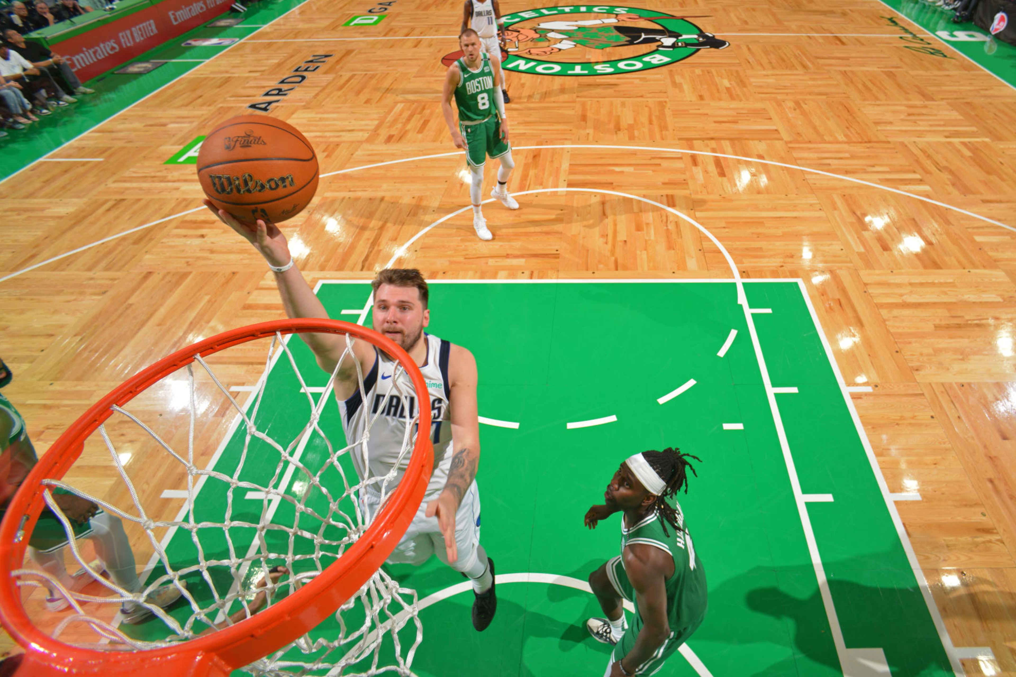 BOSTON, MA - JUNE 17: Luka Doncic #77 of the Dallas Mavericks drives to the basket during the game against the Boston Celtics during Game 5 of the 2024 NBA Finals on June 17, 2024 at the TD Garden in Boston, Massachusetts. NOTE TO USER: User expressly acknowledges and agrees that, by downloading and or using this photograph, User is consenting to the terms and conditions of the Getty Images License Agreement. Mandatory Copyright Notice: Copyright 2024 NBAE (Photo by Jesse D. Garrabrant/NBAE via Getty Images) BOSTON, MA - JUNE 17: Luka Doncic #77 of the Dallas Mavericks drives to the basket during the game against the Boston Celtics during Game 5 of the 2024 NBA Finals on June 17, 2024 at the TD Garden in Boston, Massachusetts. NOTE TO USER: User expressly acknowledges and agrees that, by downloading and or using this photograph, User is consenting to the terms and conditions of the Getty Images License Agreement. Mandatory Copyright Notice: Copyright 2024 NBAE (Photo by Jesse D. Garrabrant/NBAE via Getty Images)