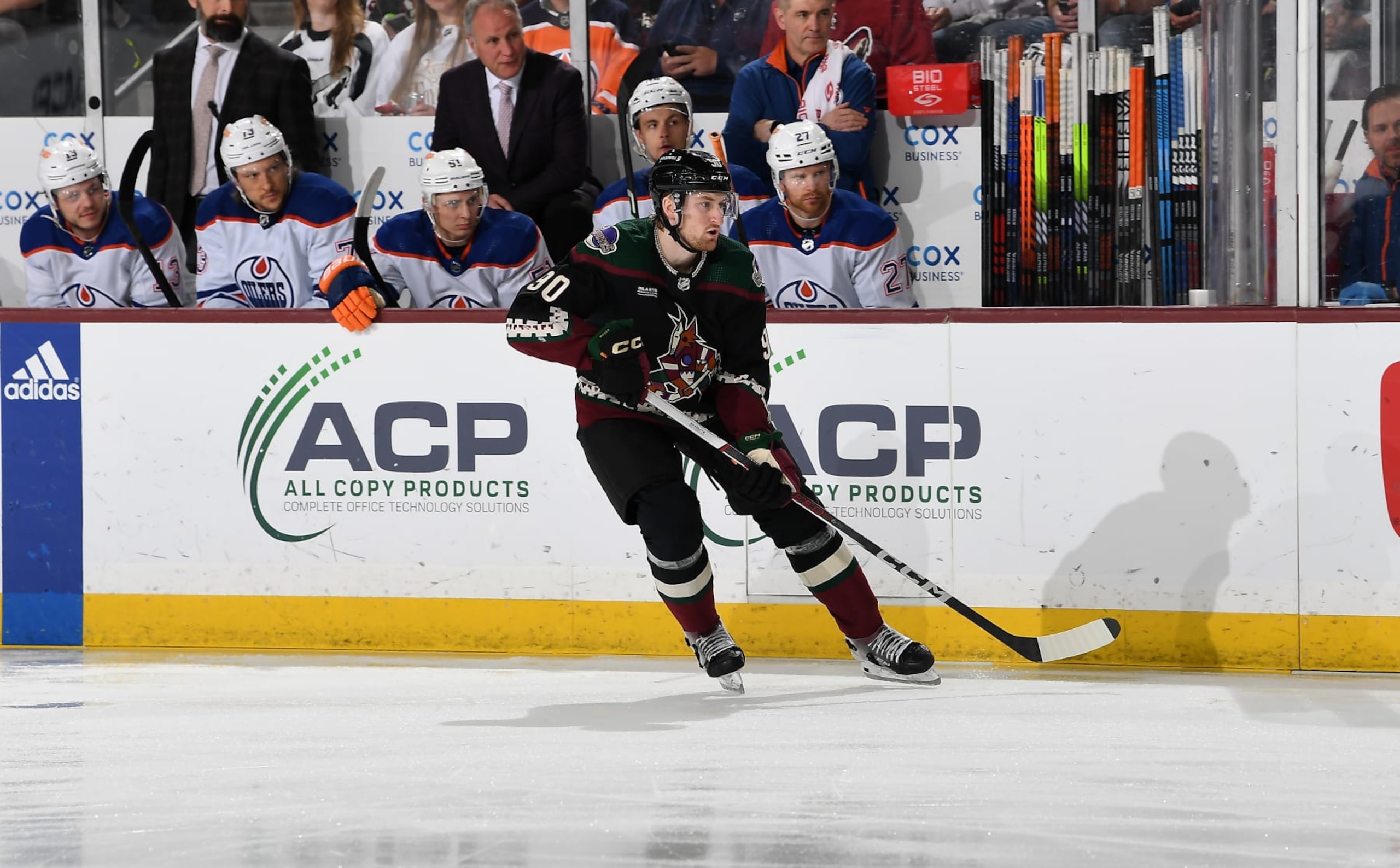 TEMPE, ARIZONA - APRIL 17: JJ Moser #90 of the Arizona Coyotes skates up ice against the Edmonton Oilers at Mullett Arena on April 17, 2024 in Tempe, Arizona. (Photo by Norm Hall/NHLI via Getty Images)
